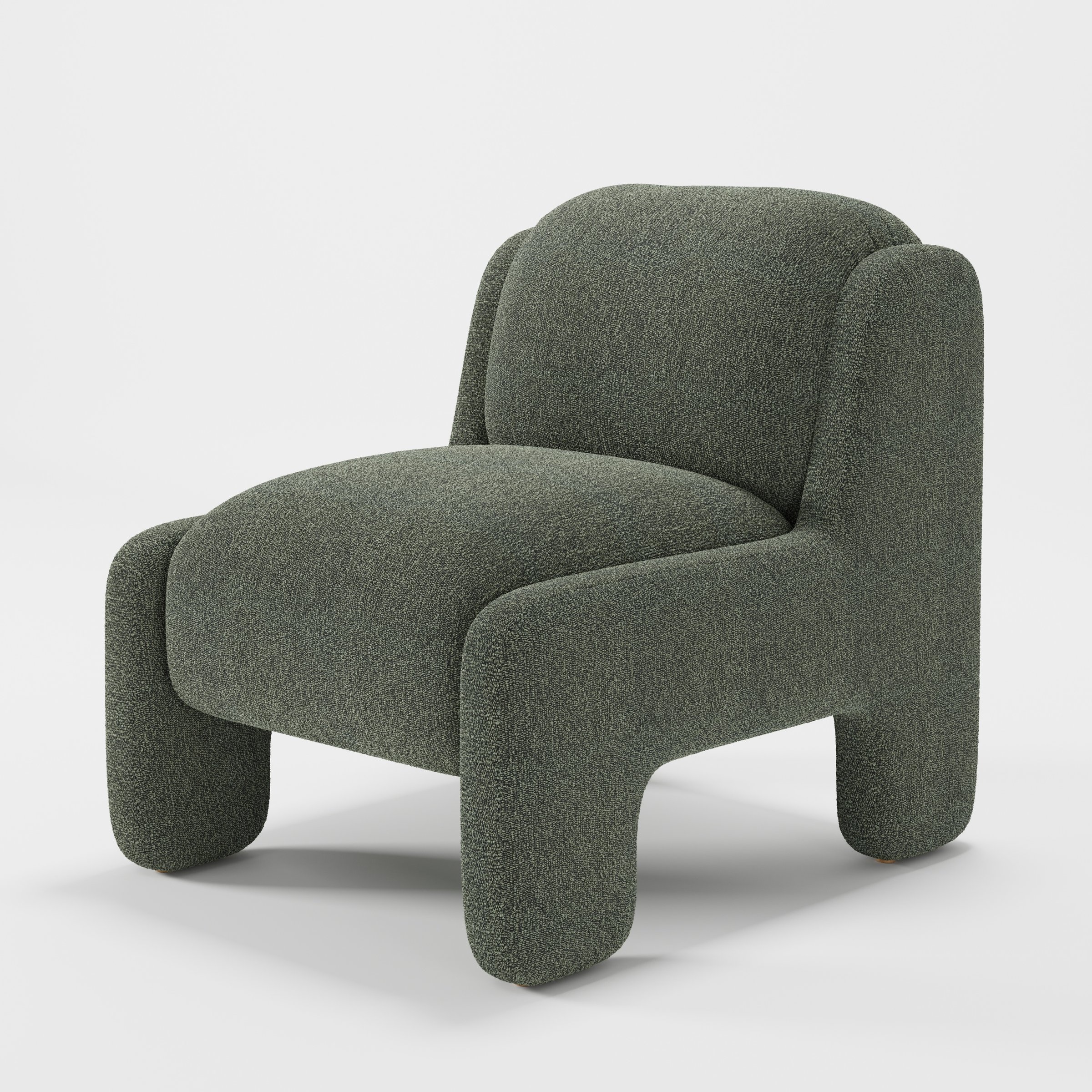 Inny armchair in Kilda Boucle Moss shown at a diagonal angle highlighting sculpted form and low seat.