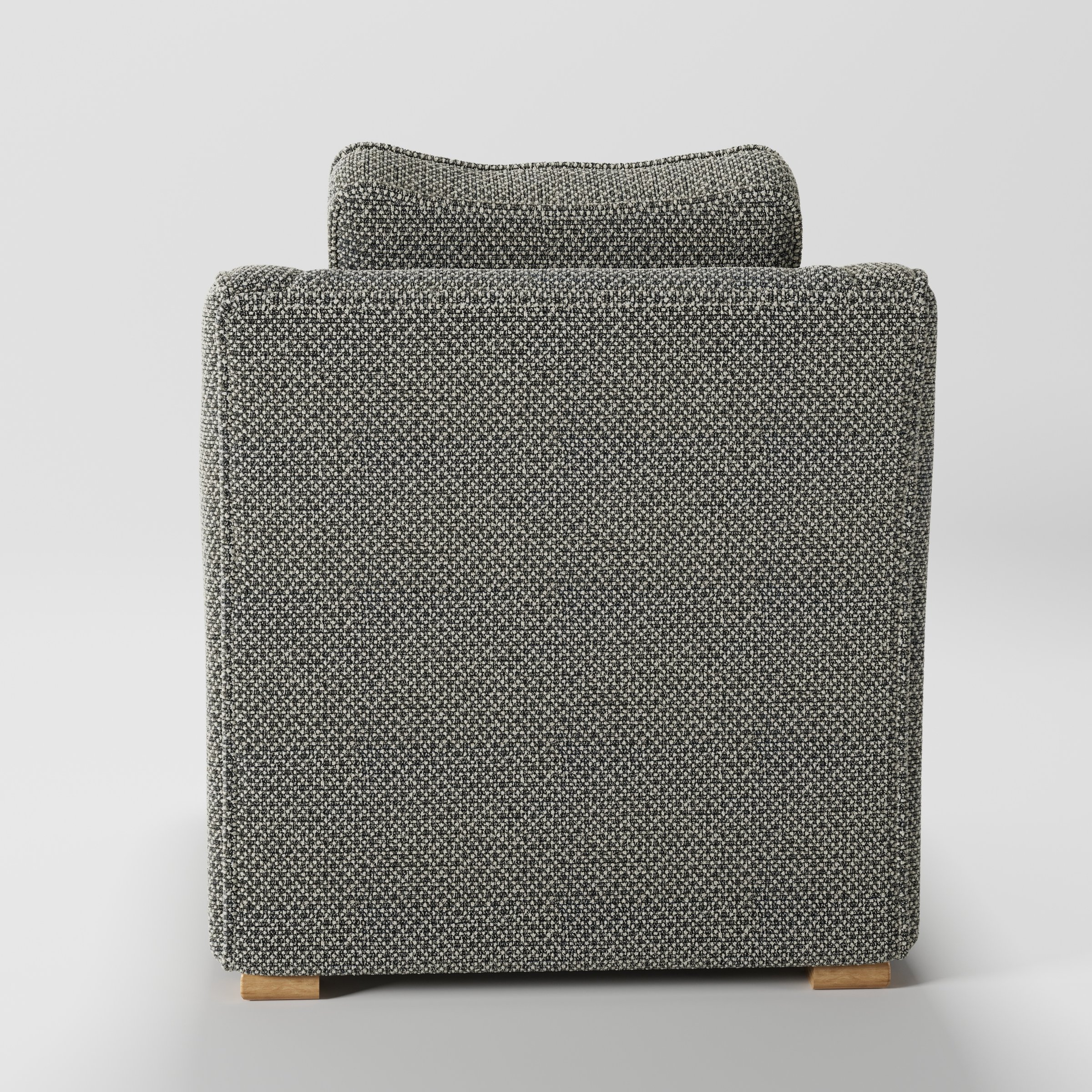 Cashel armchair in Rousay Wool Blend Tar and Chalk shown from the rear highlighting backrest shape and upholstery finish.