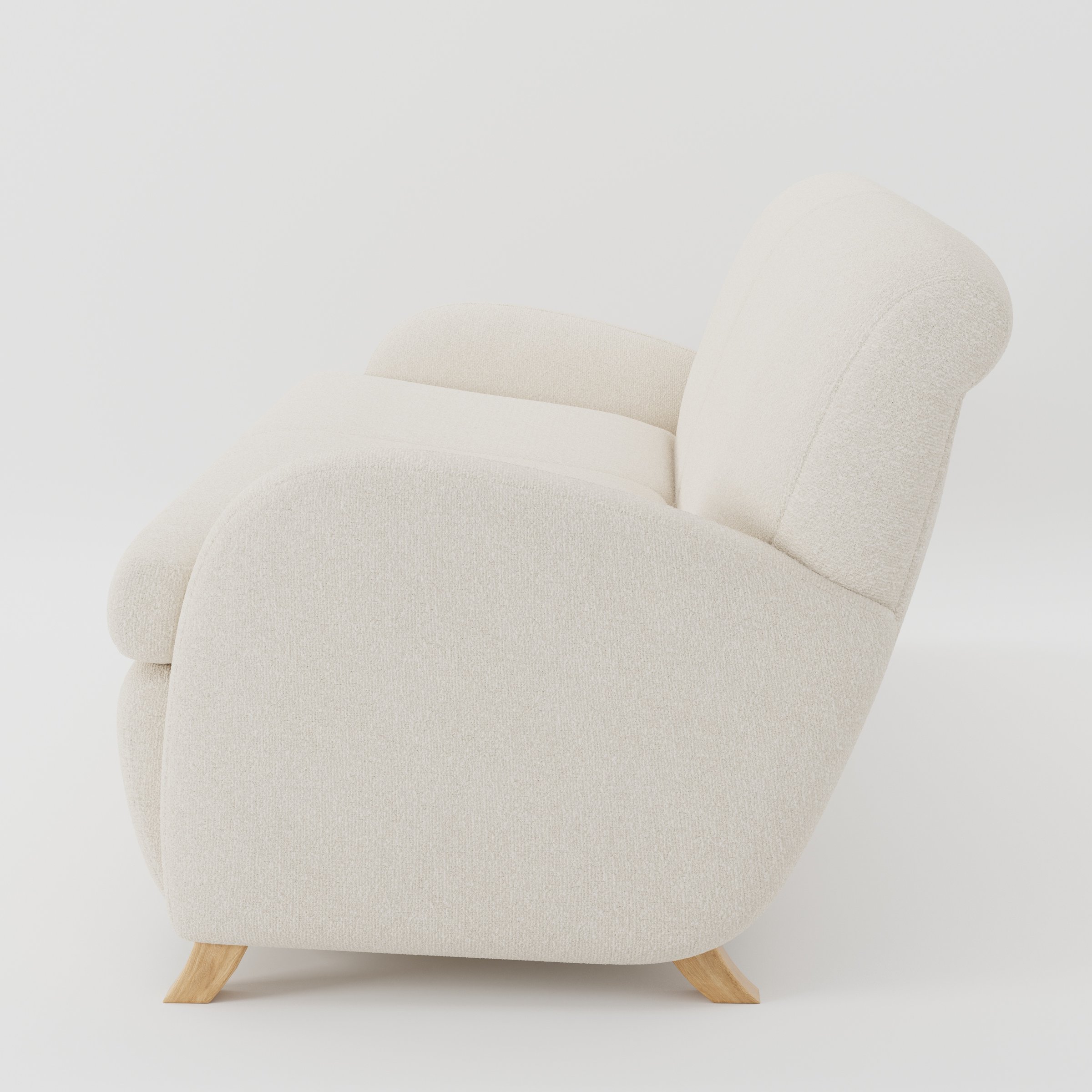 Rye sofa in Kilda Boucle Cream shown in side profile displaying proportions and overall silhouette.