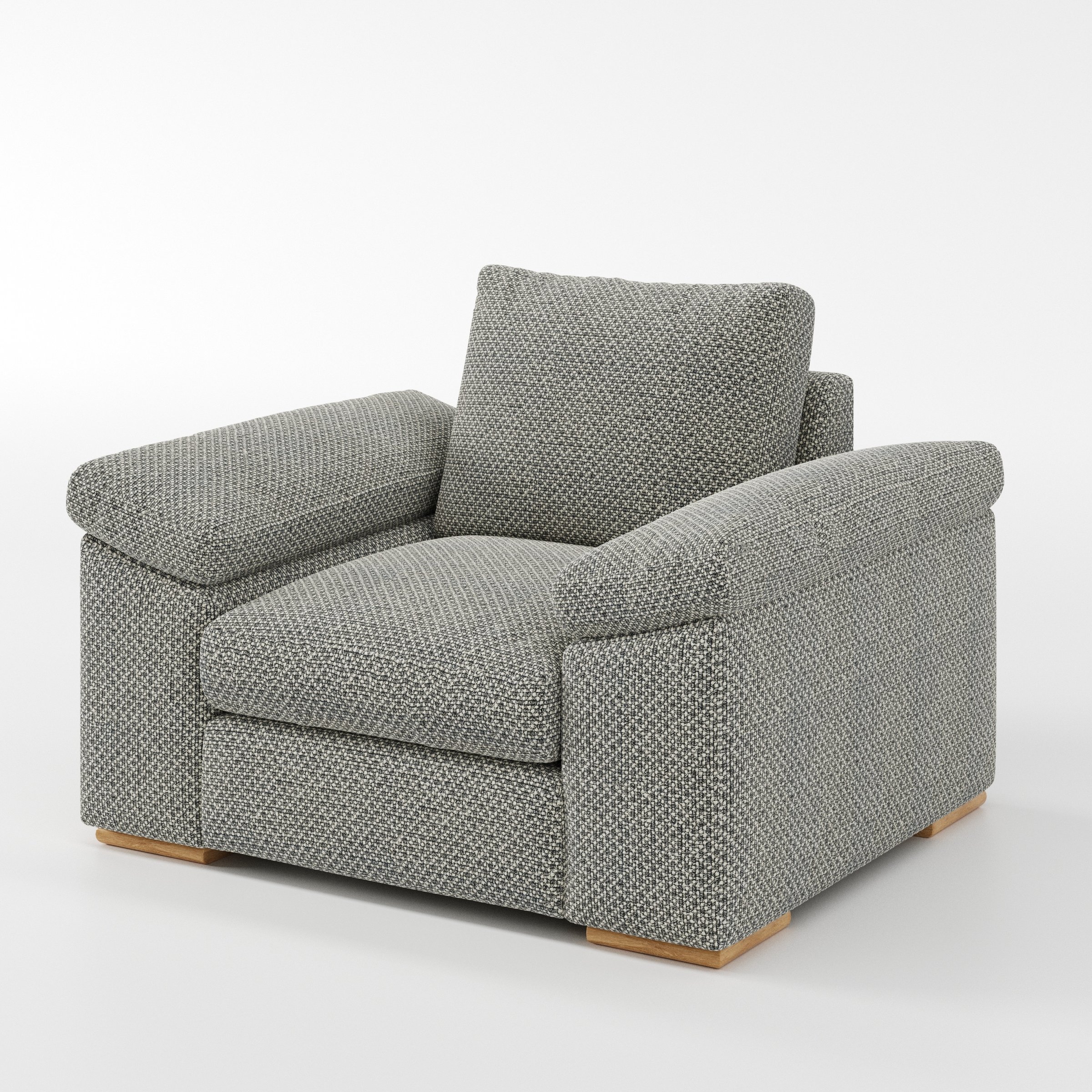 Moy armchair in Rousay Wool Blend Tar and Chalk shown at a diagonal angle highlighting arms and seat depth.