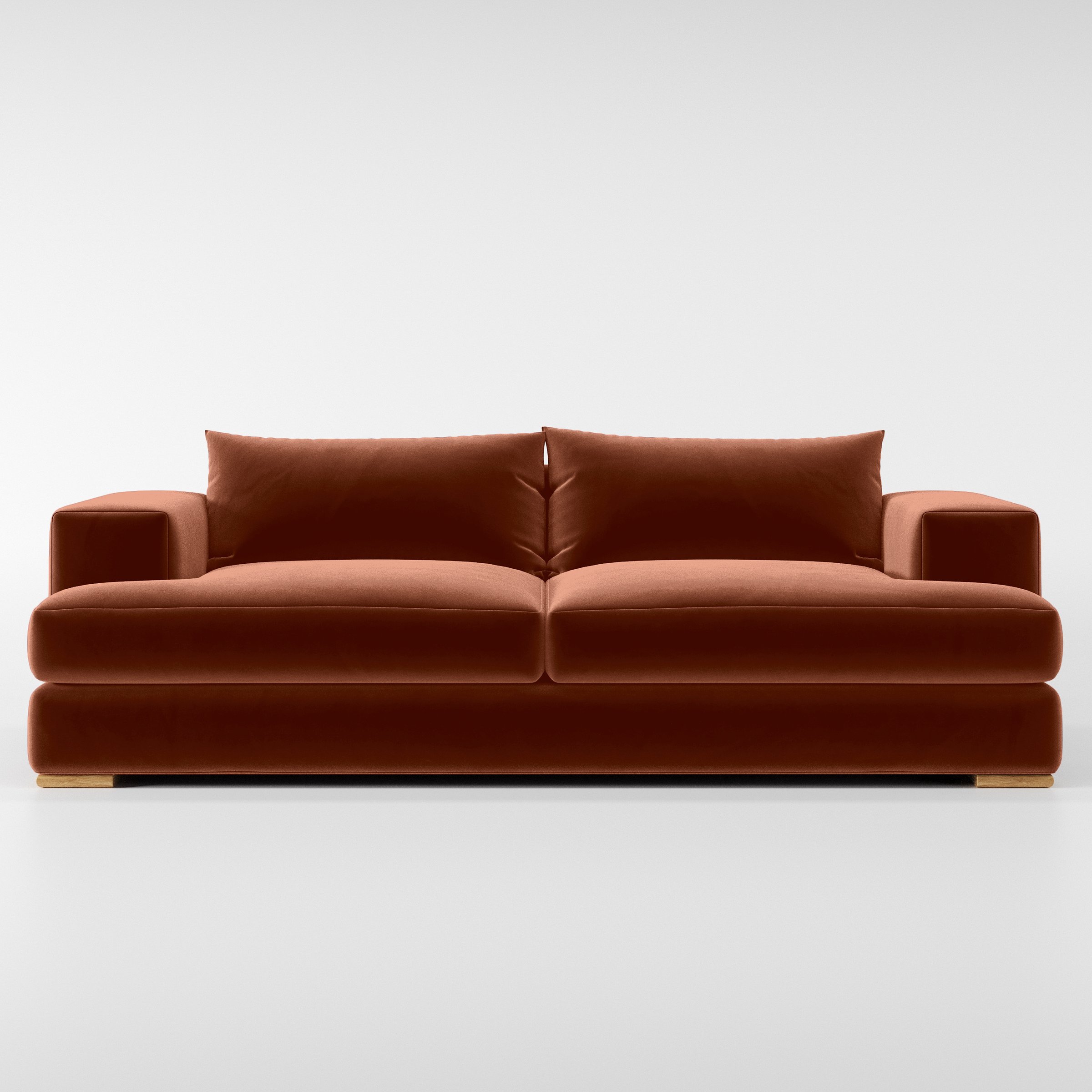 Front view of the Fane sofa upholstered in Plush EasyClean Velvet in Apricot.