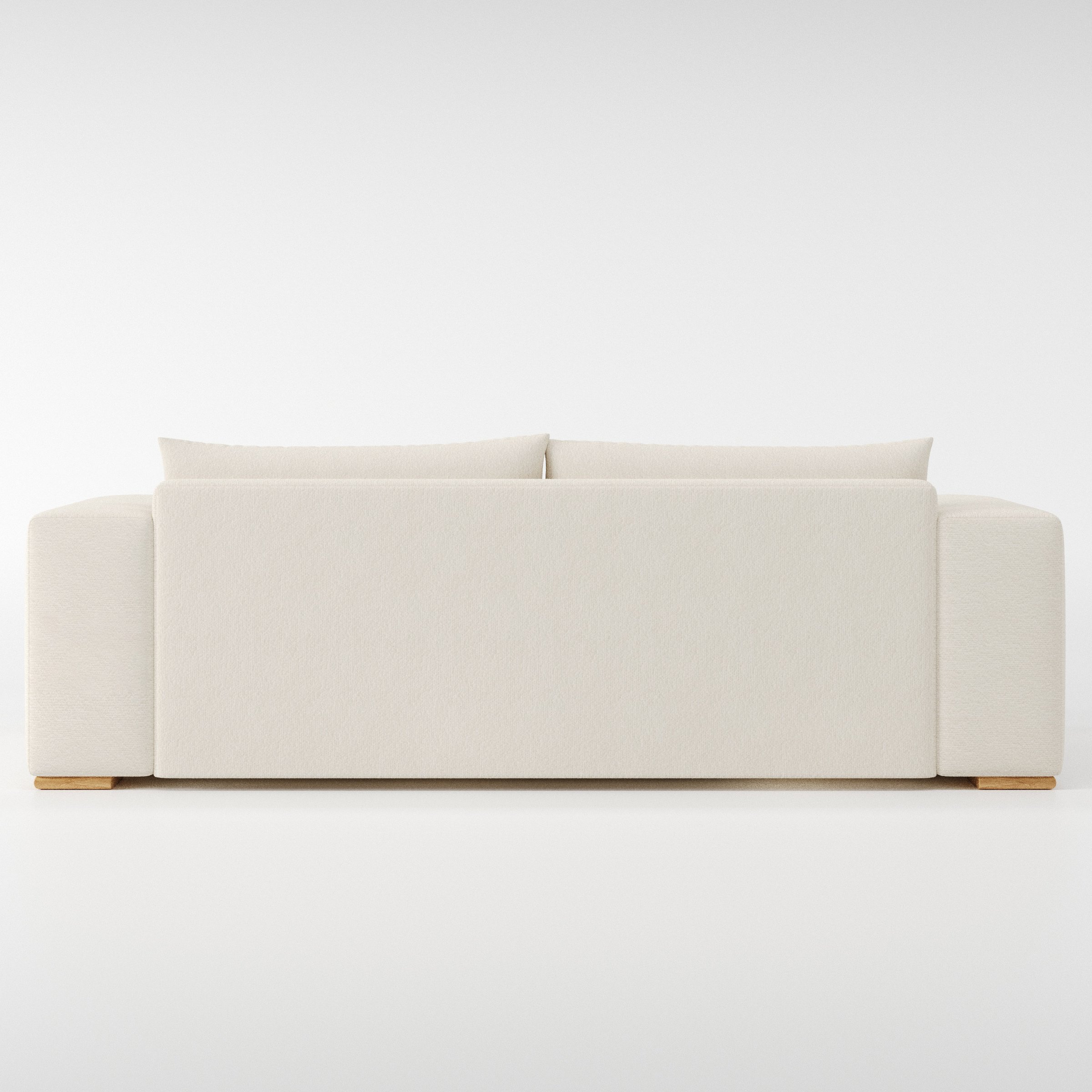 Fane sofa in Kilda Boucle Cream shown from the rear highlighting back cushions and upholstery finish.