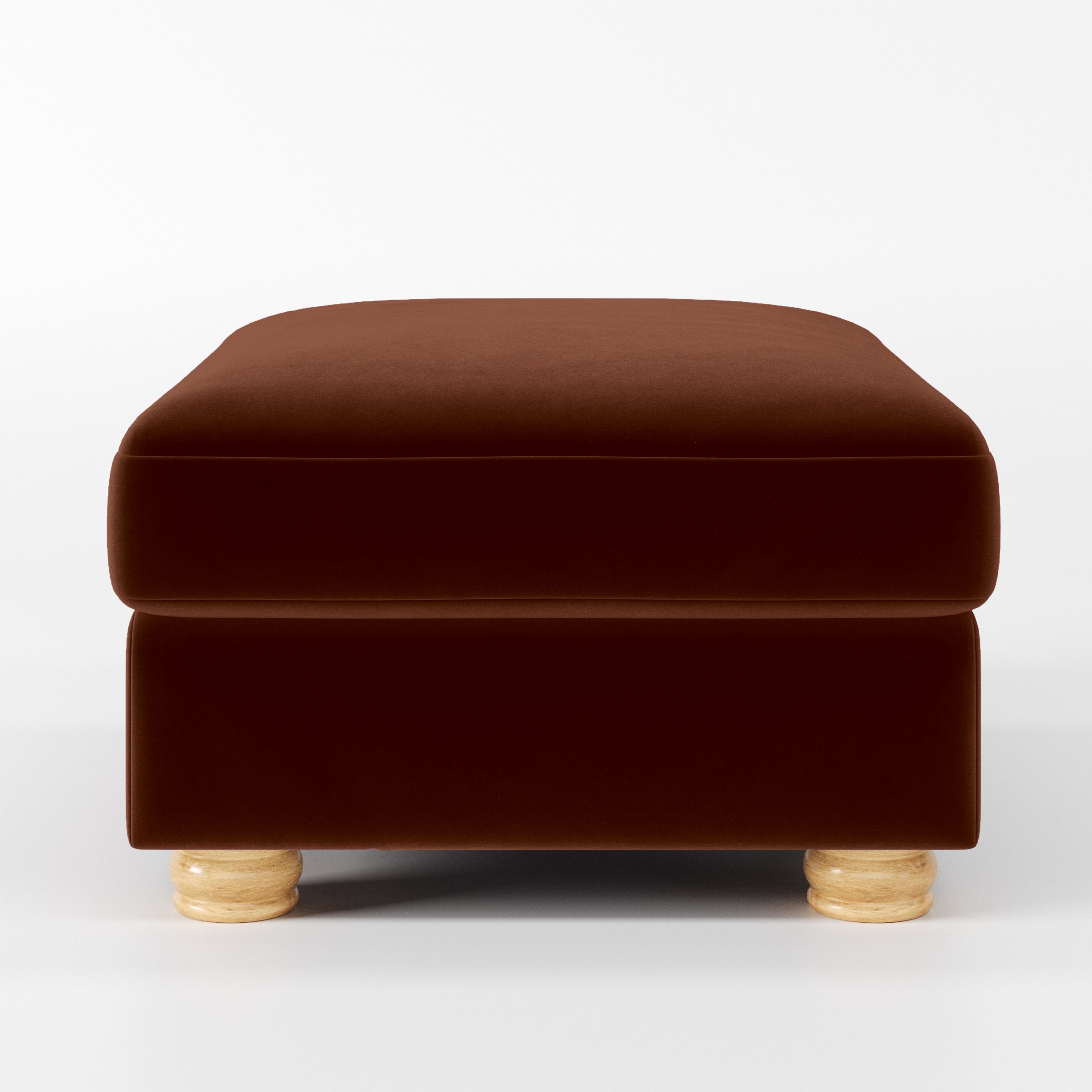 Front view of the Anna Lee footstool upholstered in Plush EasyClean Velvet in Maple.