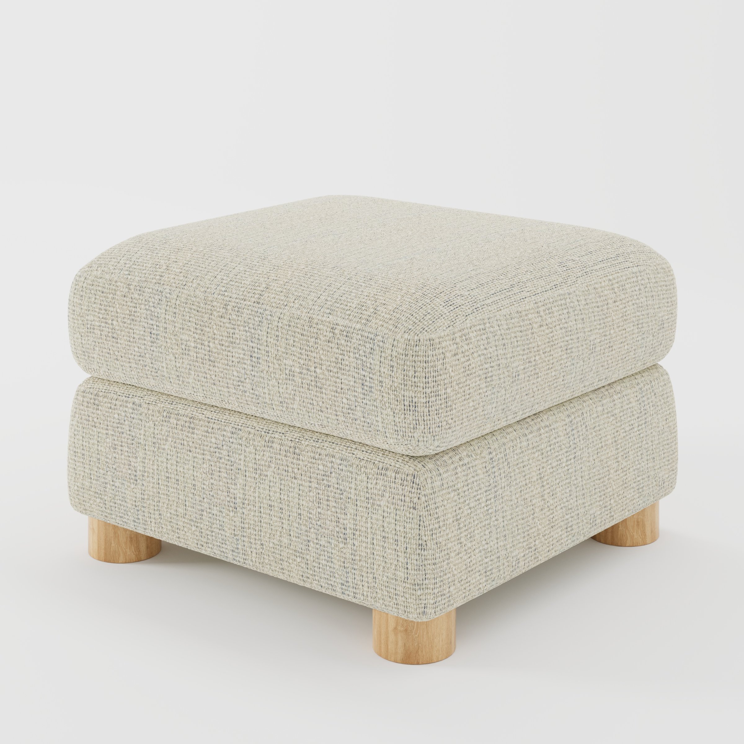 Windermere footstool in Orsay Boucle Cream and Marine shown at a diagonal angle highlighting soft corners and rounded wooden feet.