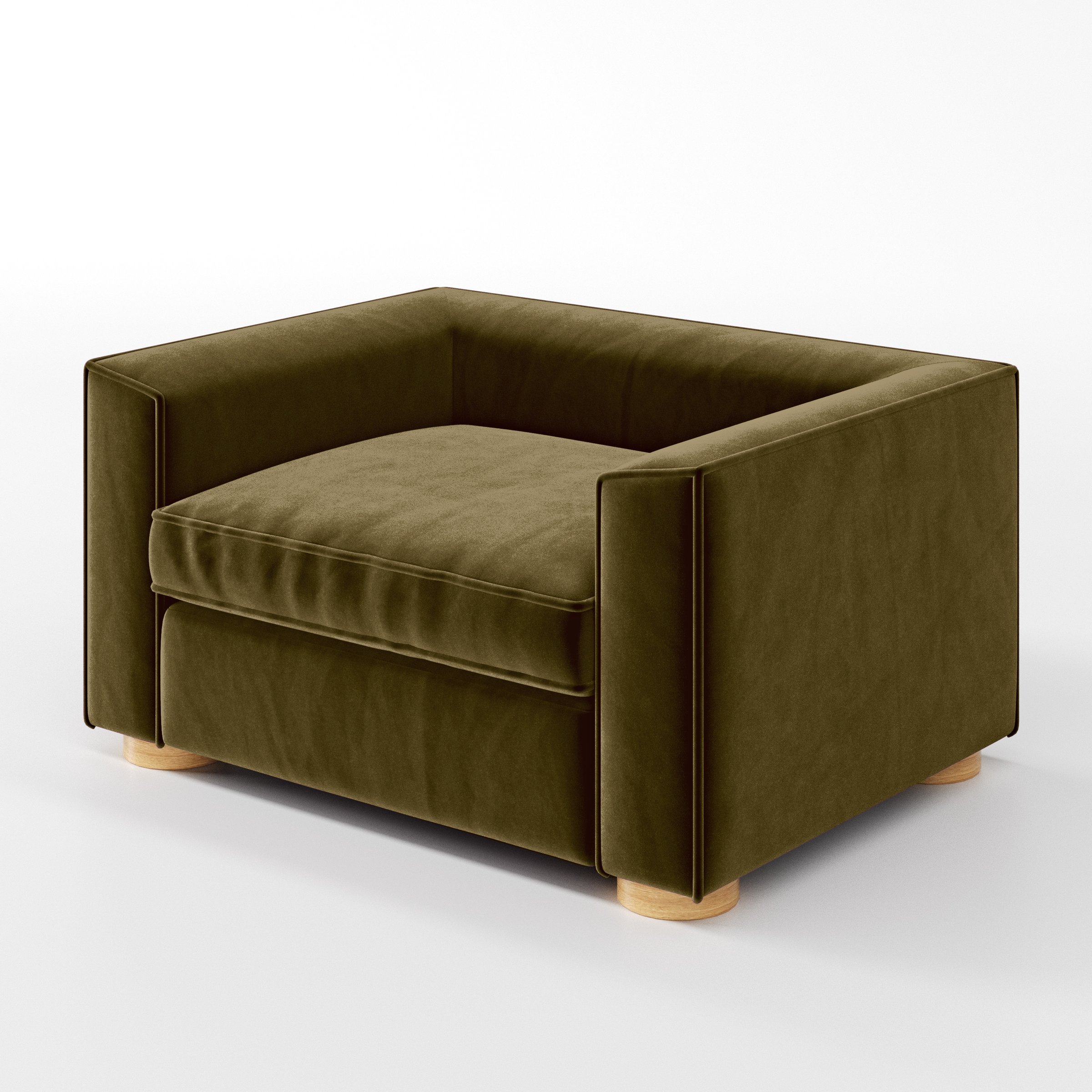 Diagonal view of the Feale armchair upholstered in Plush EasyClean Velvet in Cedar.