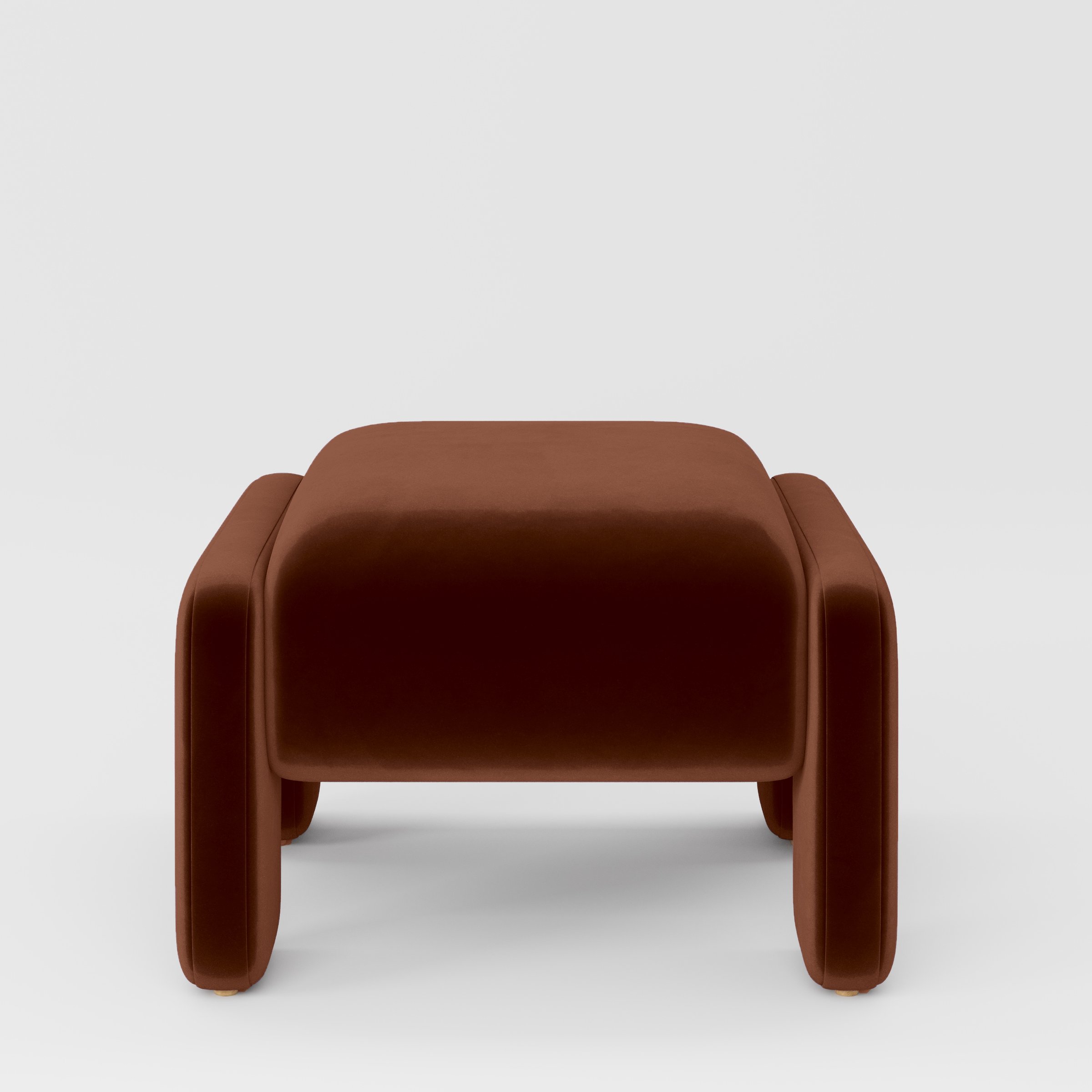 Front view of the Inny footstool upholstered in Plush EasyClean Velvet in Maple.