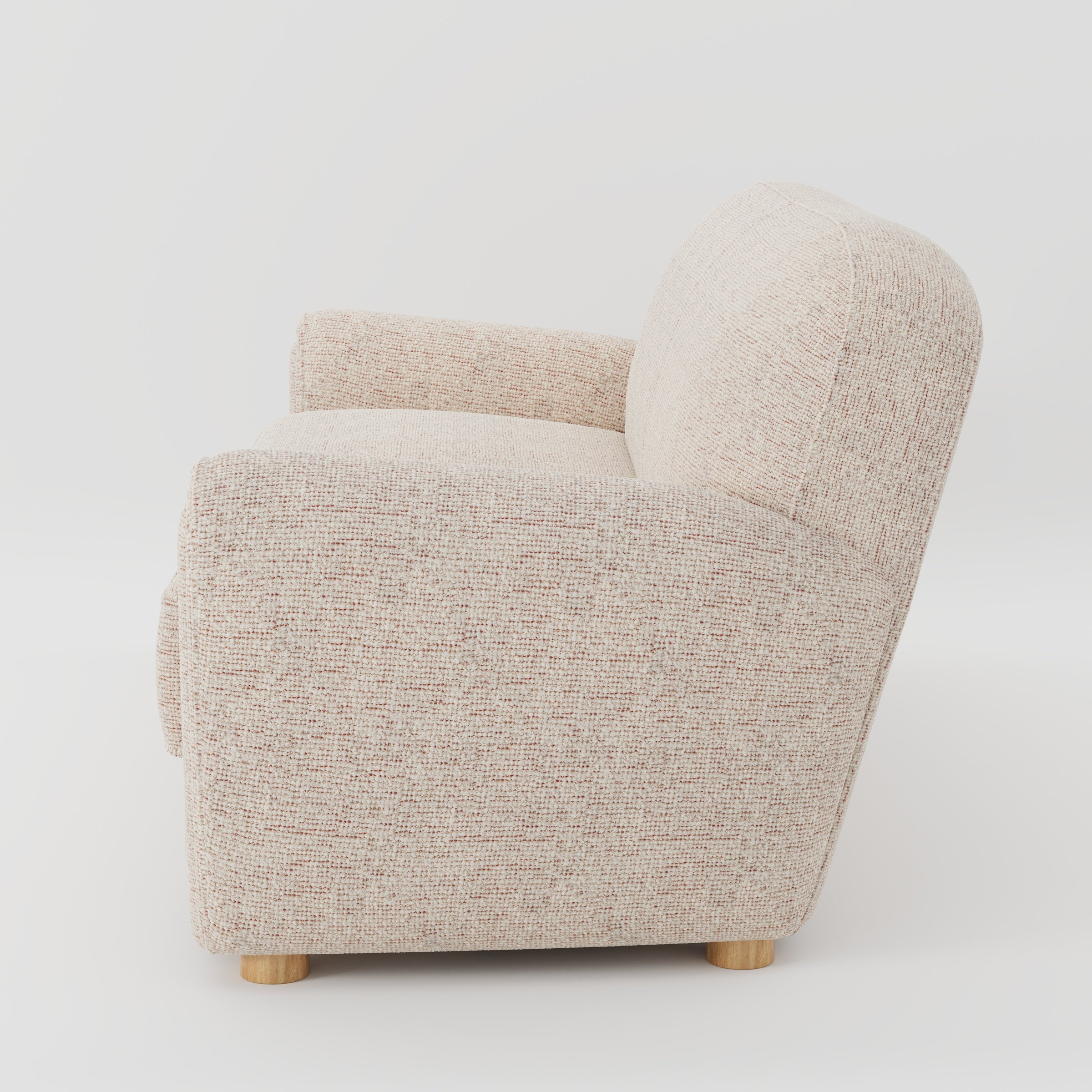Fergus sofa in Orsay Boucle Cream and Copper shown in side profile displaying proportions and overall silhouette.