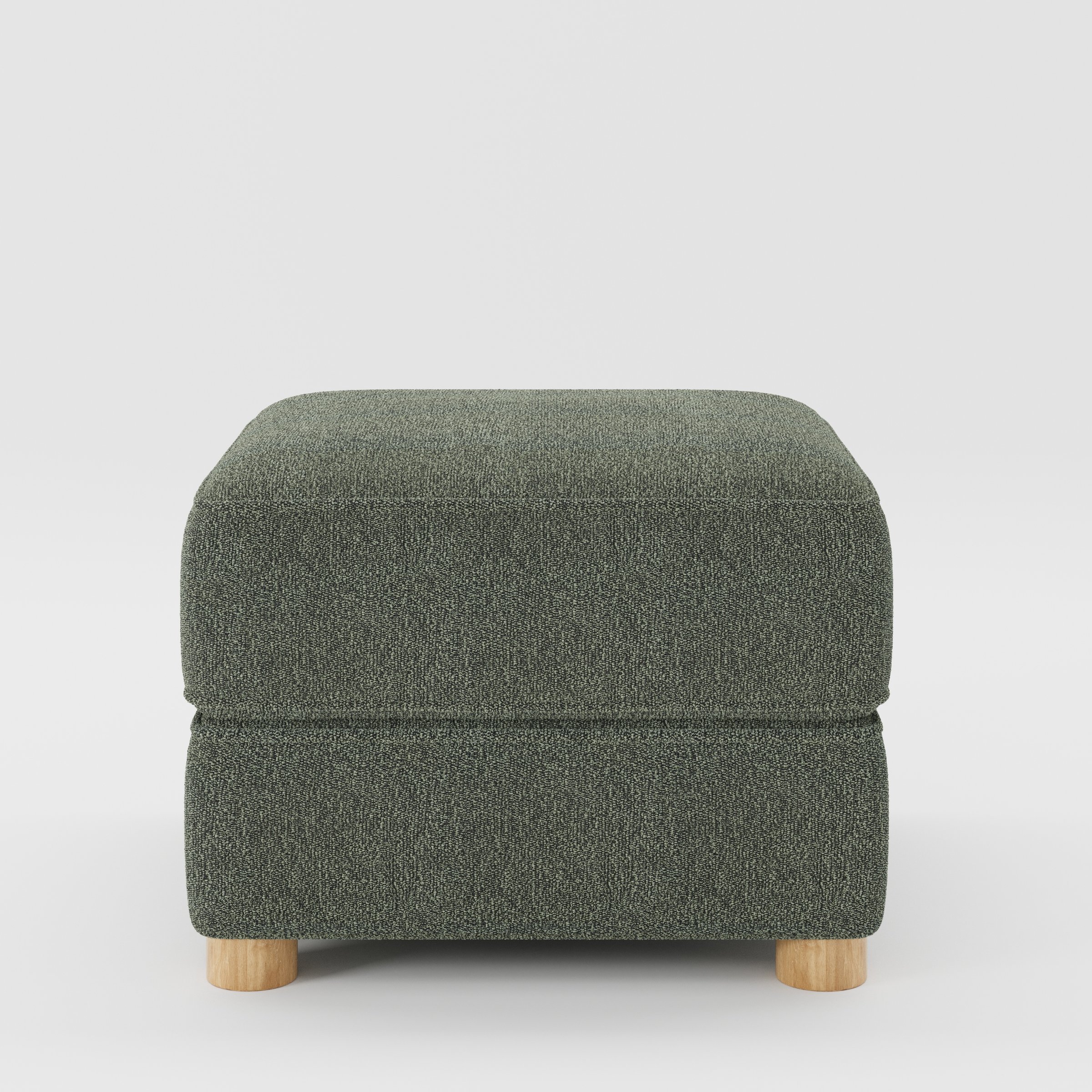 Fergus footstool in Kilda Boucle Moss shown front-on against a neutral studio backdrop.