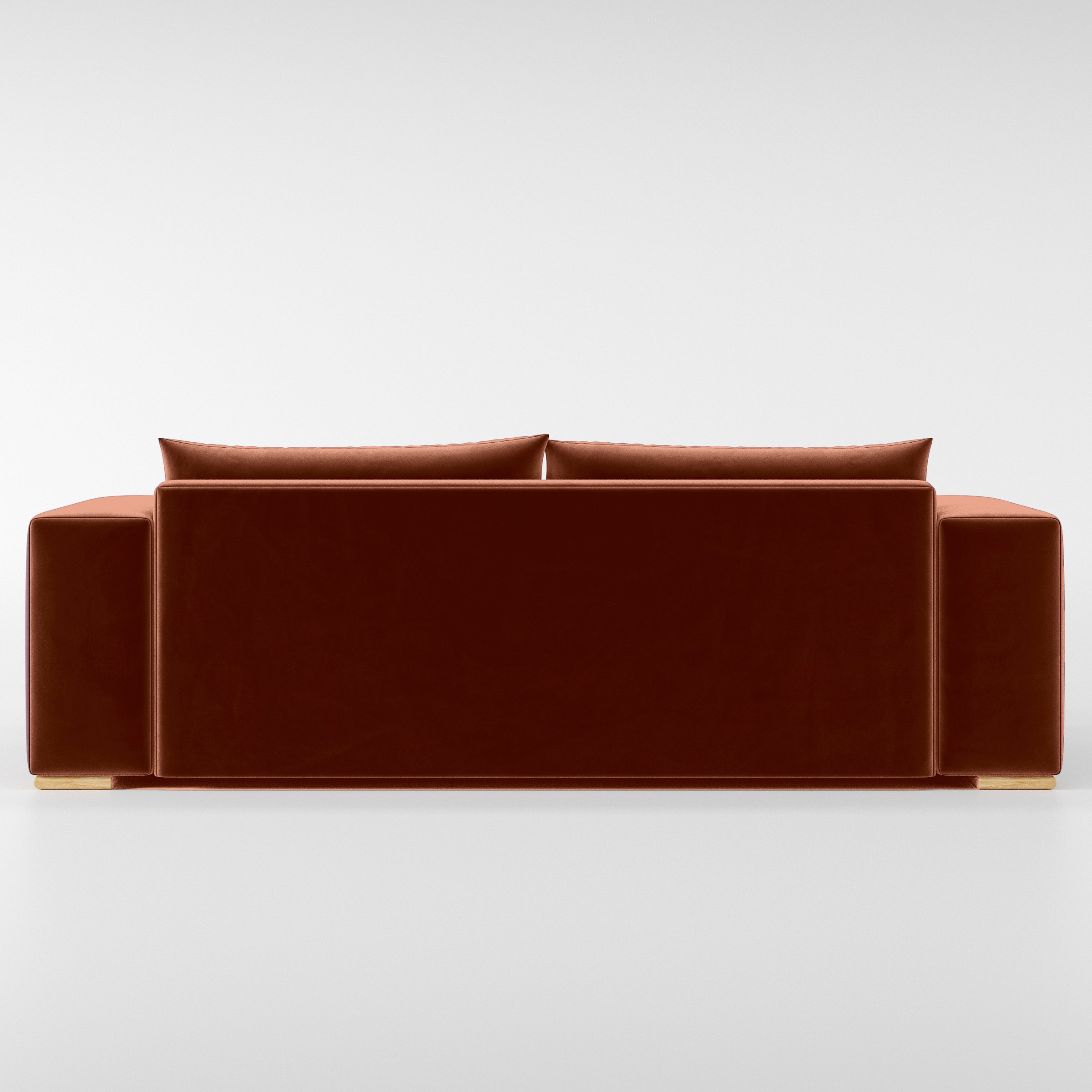 Rear view of the Fane sofa upholstered in Plush EasyClean Velvet in Apricot.