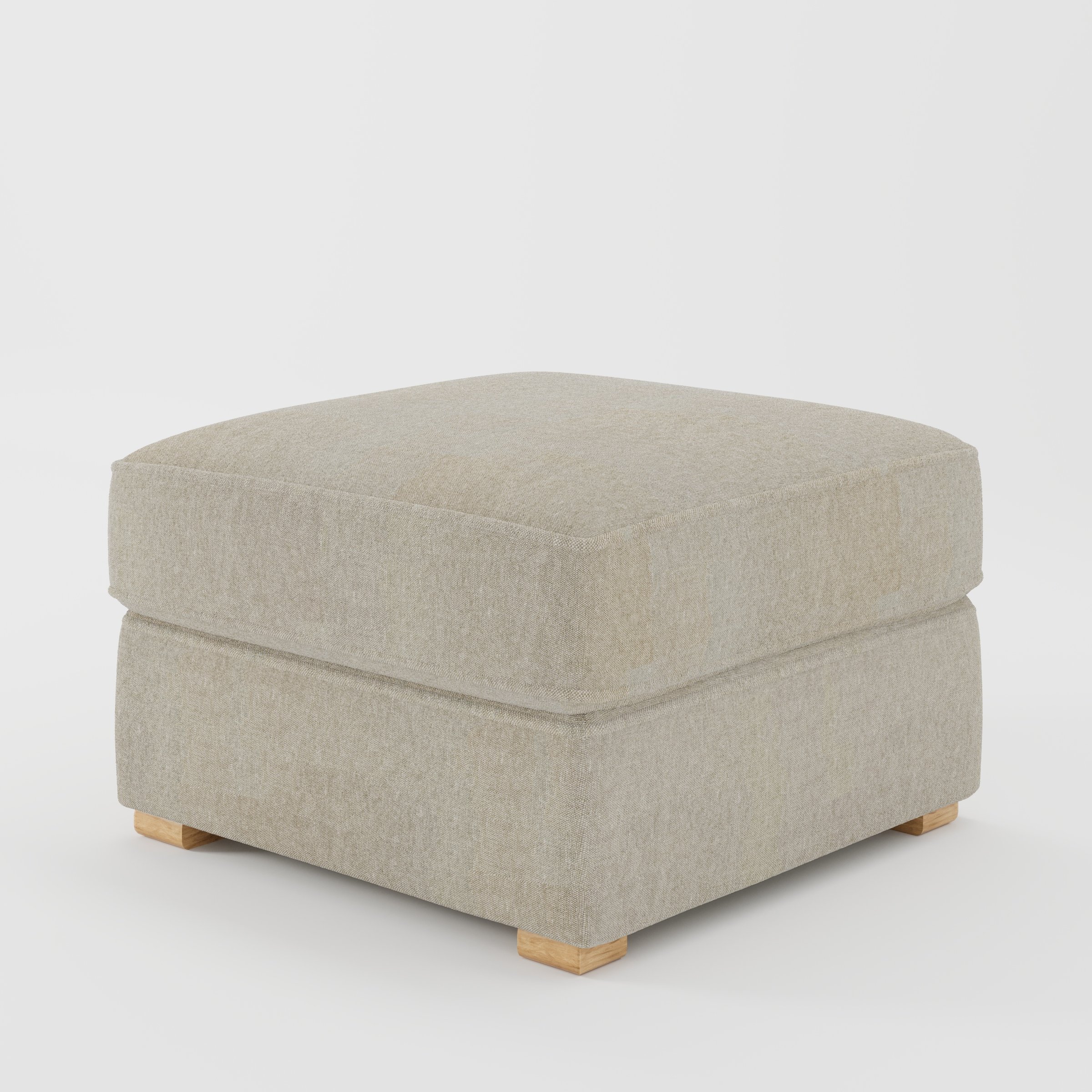 Cashel footstool in Alderney Linen Oatmeal shown at a diagonal angle highlighting layered cushioning and low wooden feet.