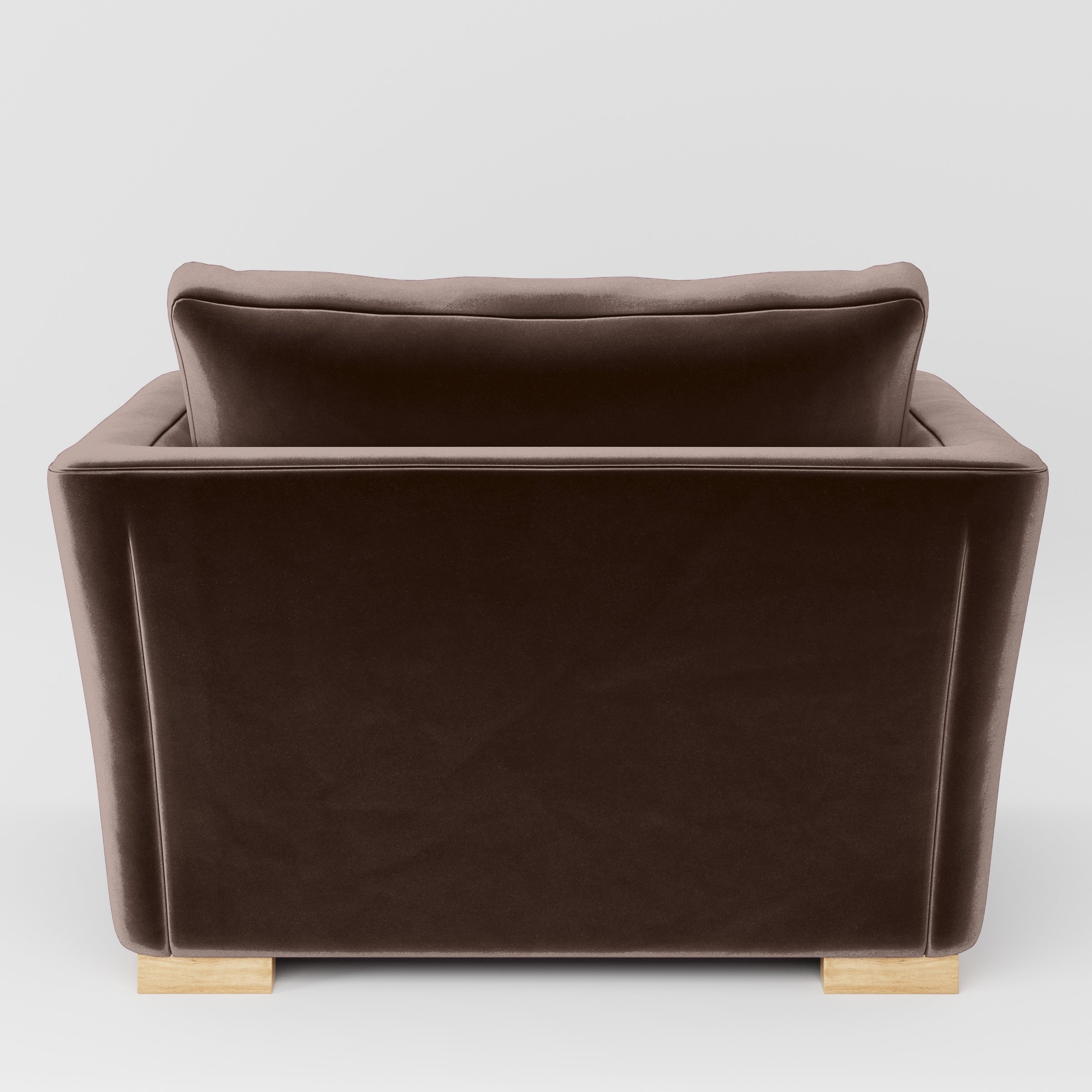 Rear view of the Stowe armchair upholstered in Plush EasyClean Velvet in Mole.