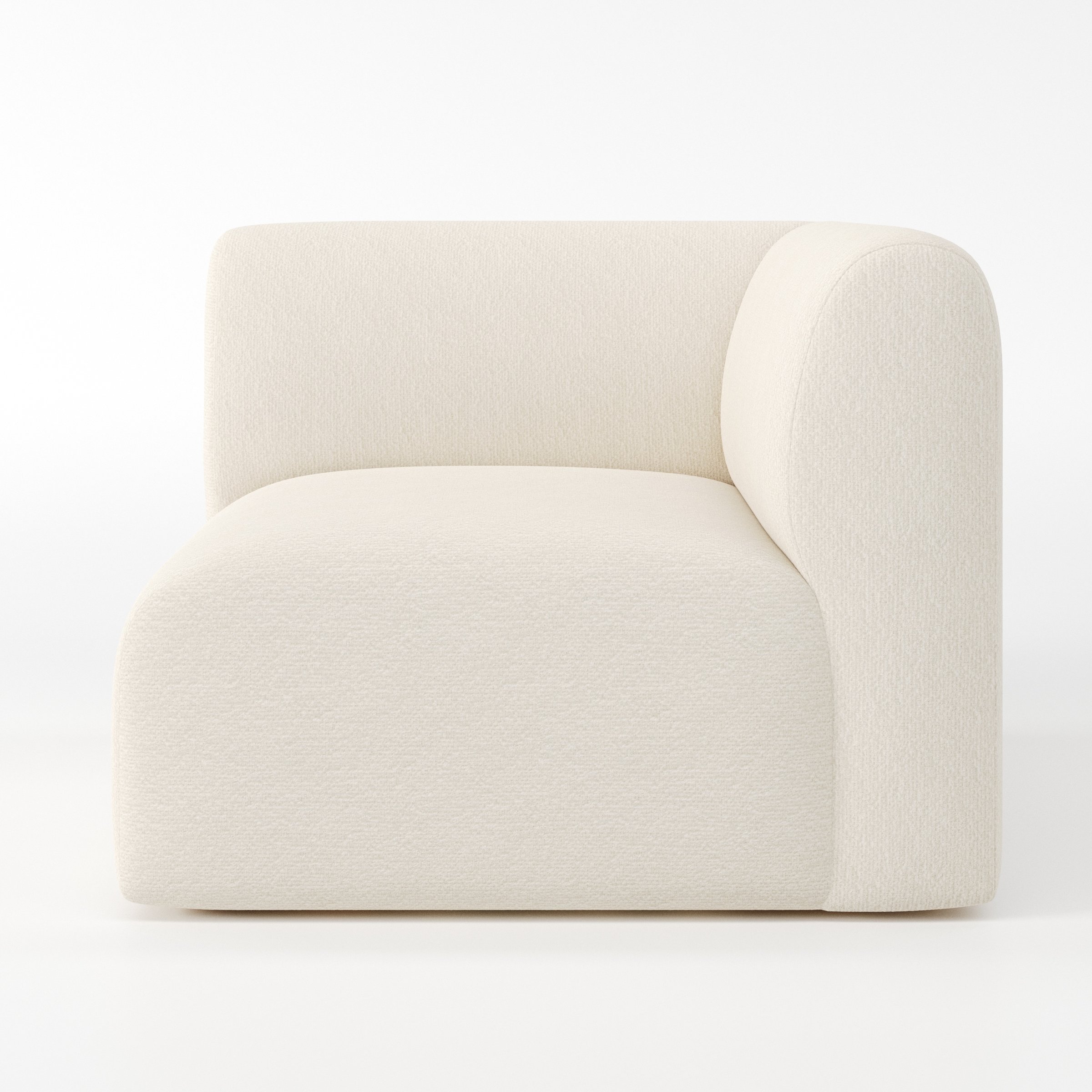Drumquin modular sofa corner unit in Kilda Bouclé Cream shown from the right highlighting the wraparound back and soft, sculpted form.