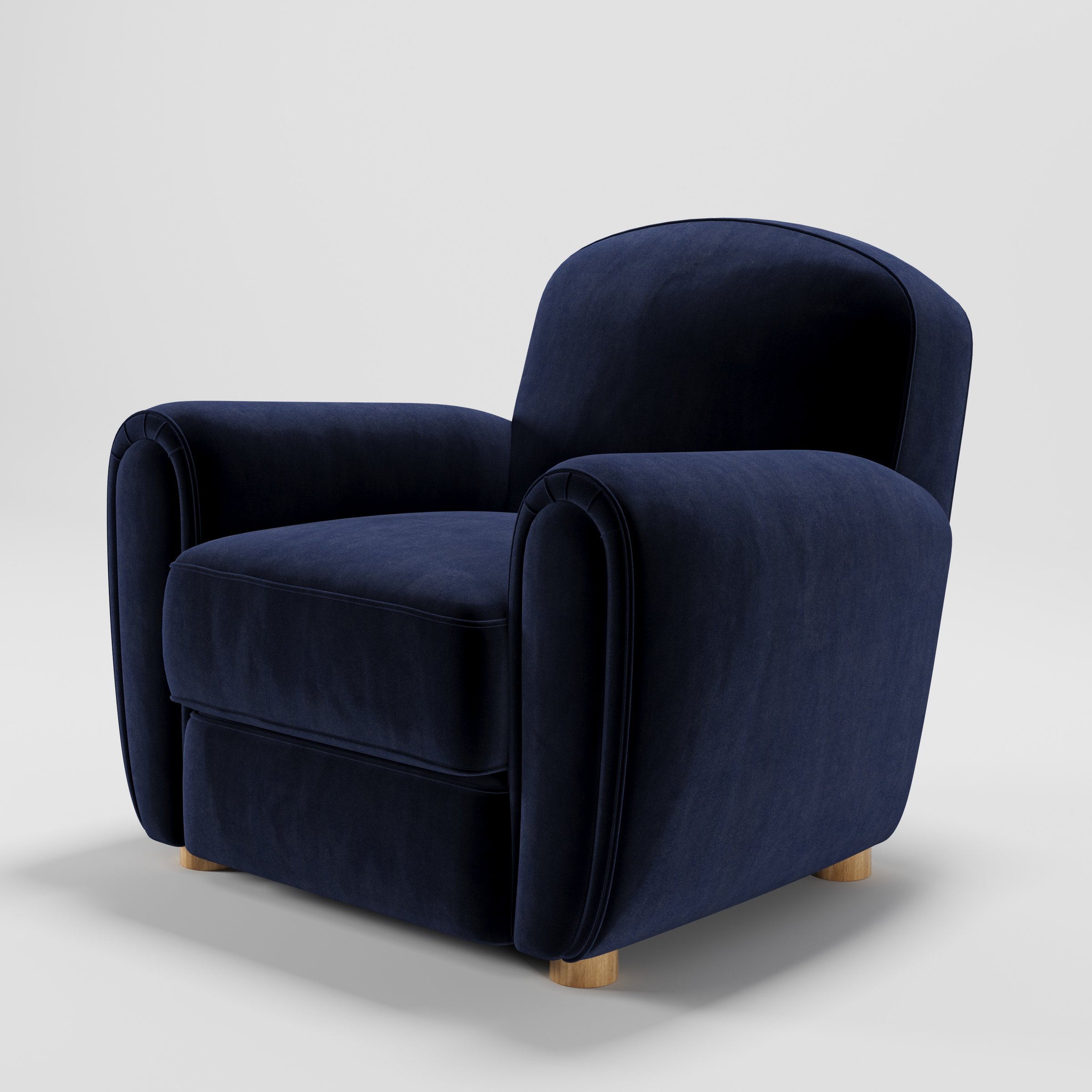 Fergus armchair in Noss Velvet Navy shown at a diagonal angle highlighting rounded arms and seat depth.
