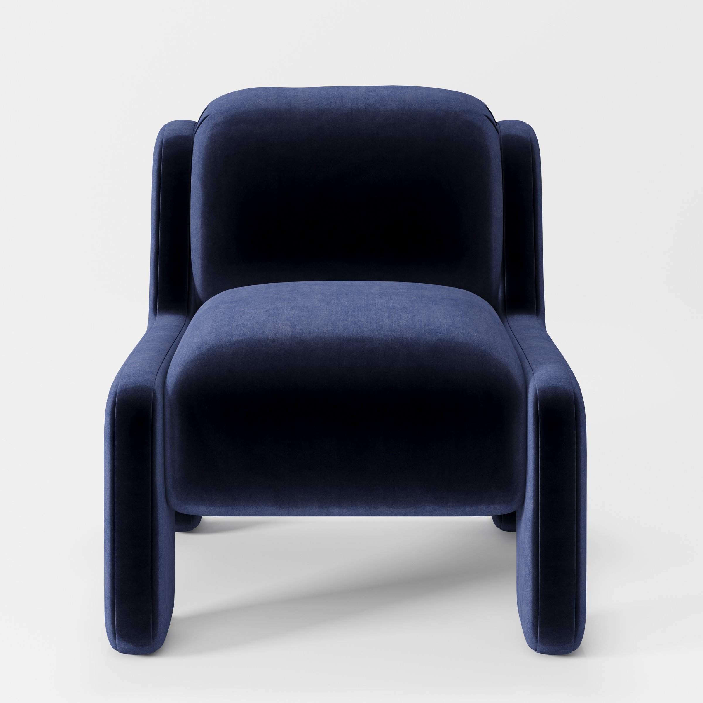 Inny armchair in Noss Velvet Navy shown front-on against a neutral studio backdrop.