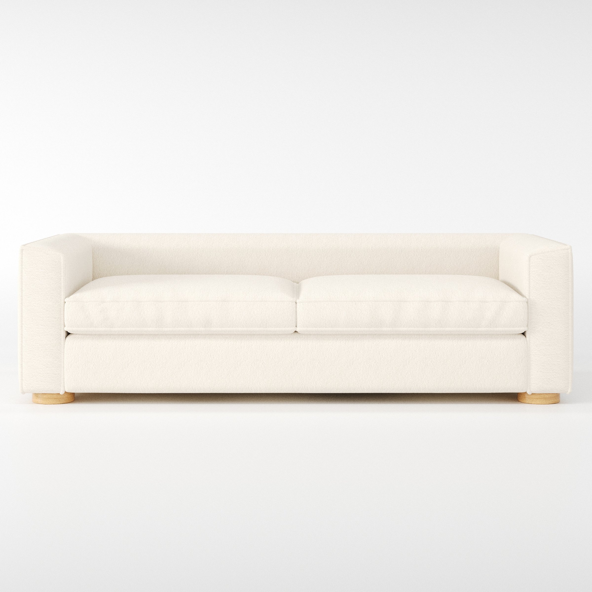 Feale sofa in Kilda Boucle Cream shown front-on against a neutral studio backdrop.