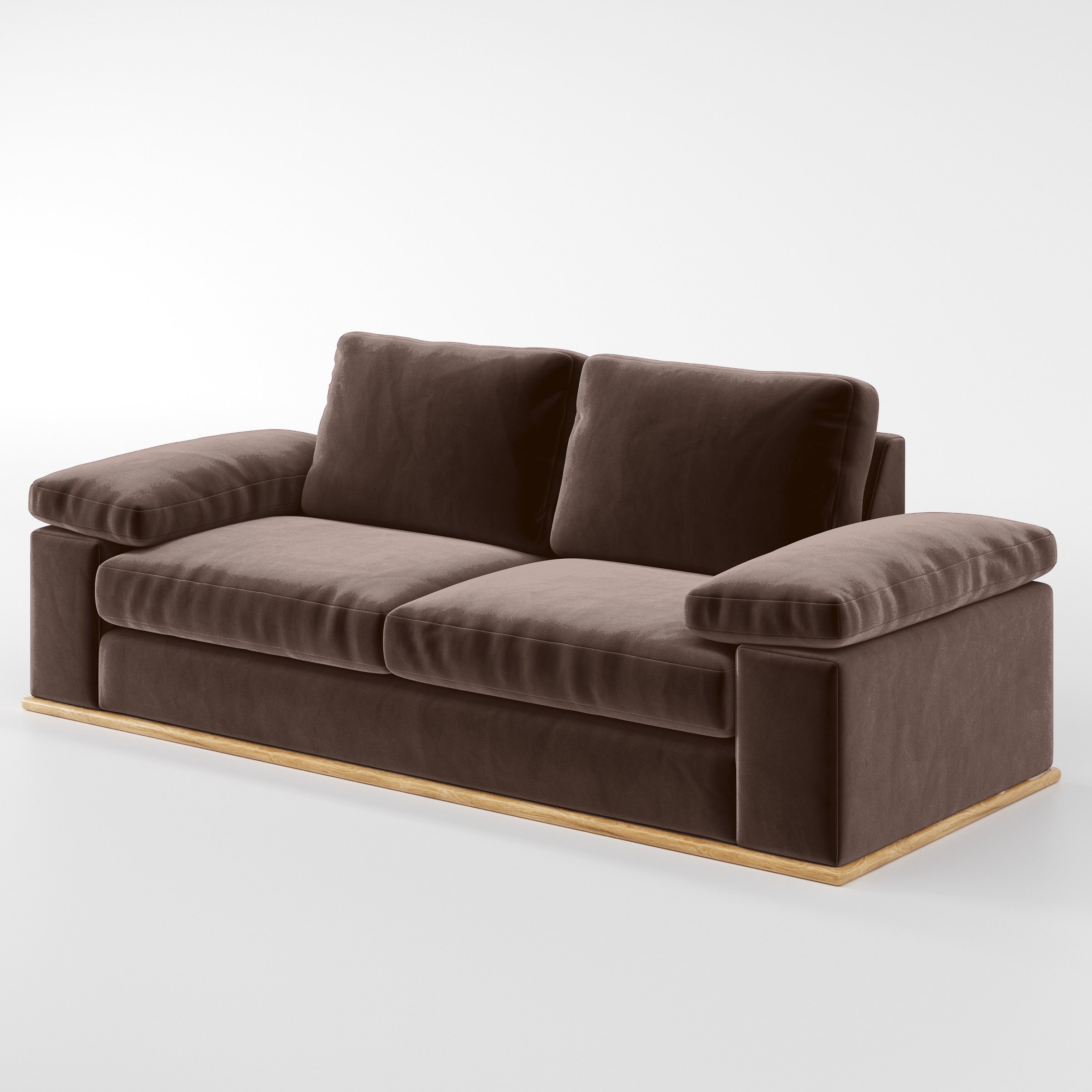 Diagonal view of the Cusher sofa upholstered in Plush EasyClean Velvet in Mole.