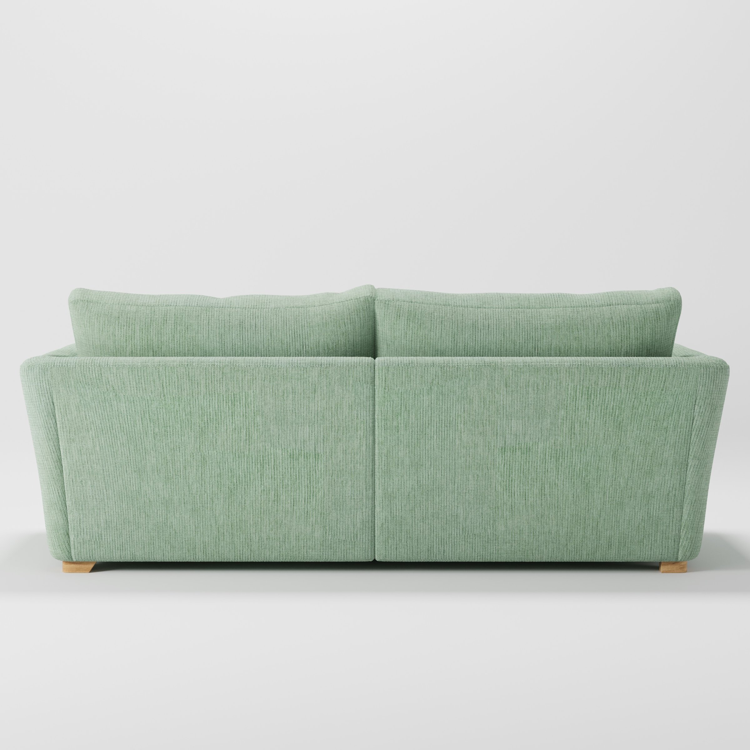 Stowe sofa in Caldey Velvet Corduroy Eucalyptus shown from the rear highlighting back cushions and upholstery finish.