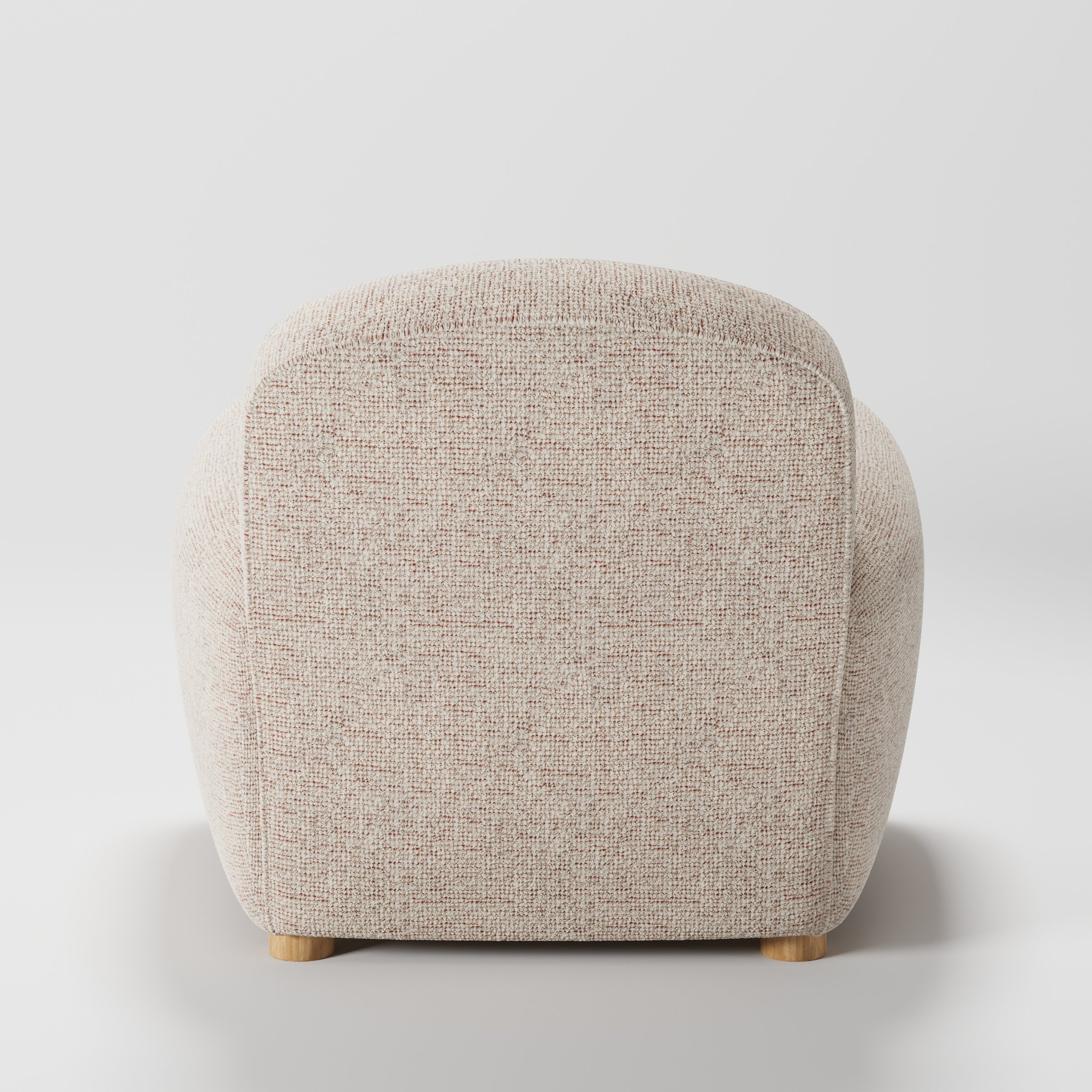 Fergus armchair in Orsay Boucle Cream and Copper shown from the rear highlighting backrest shape and upholstery finish.