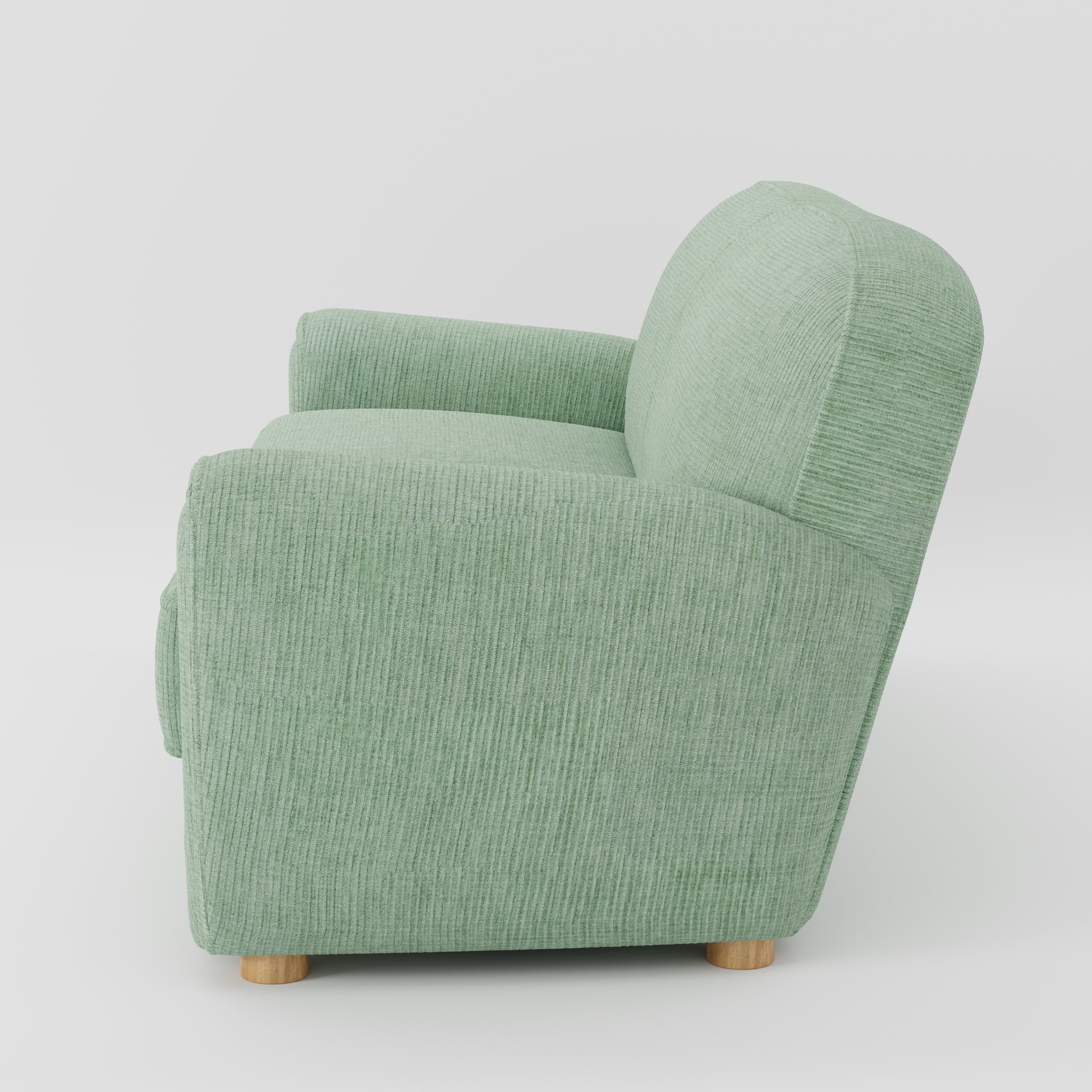 Fergus sofa in Caldey Velvet Corduroy Eucalyptus shown in side profile displaying proportions and overall silhouette.