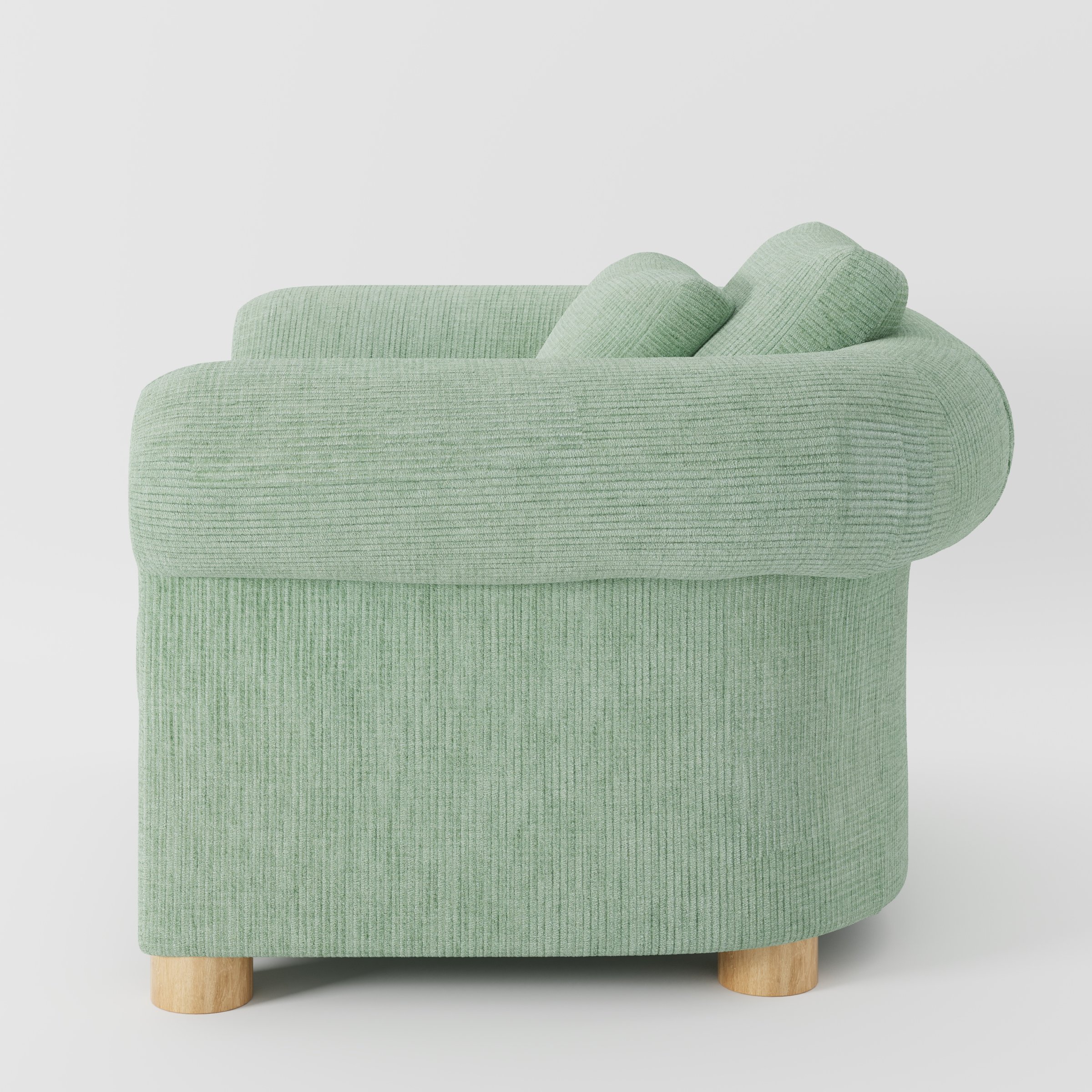 Windermere armchair in Caldey Velvet Corduroy Eucalyptus shown in side profile displaying proportions and overall silhouette.
