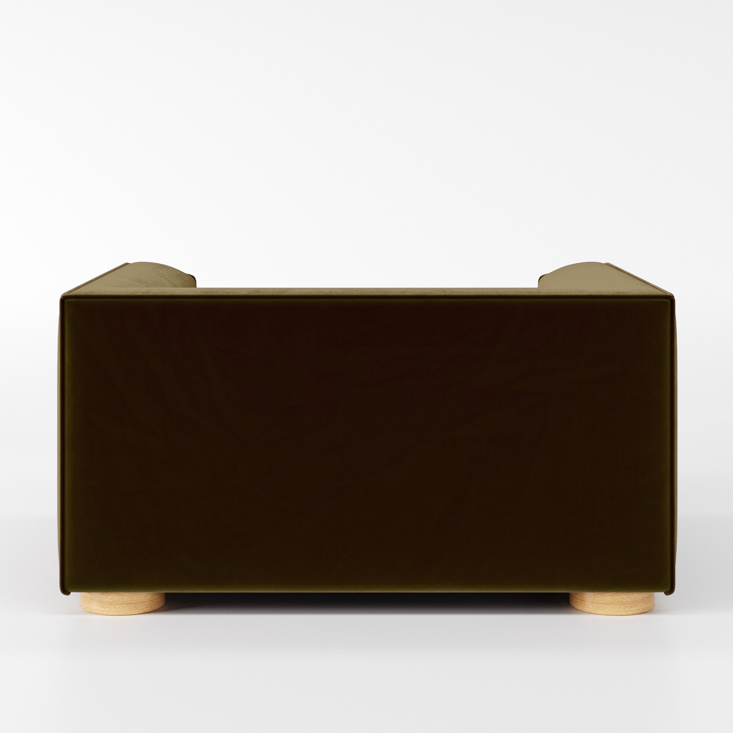 Rear view of the Feale armchair upholstered in Plush EasyClean Velvet in Cedar.