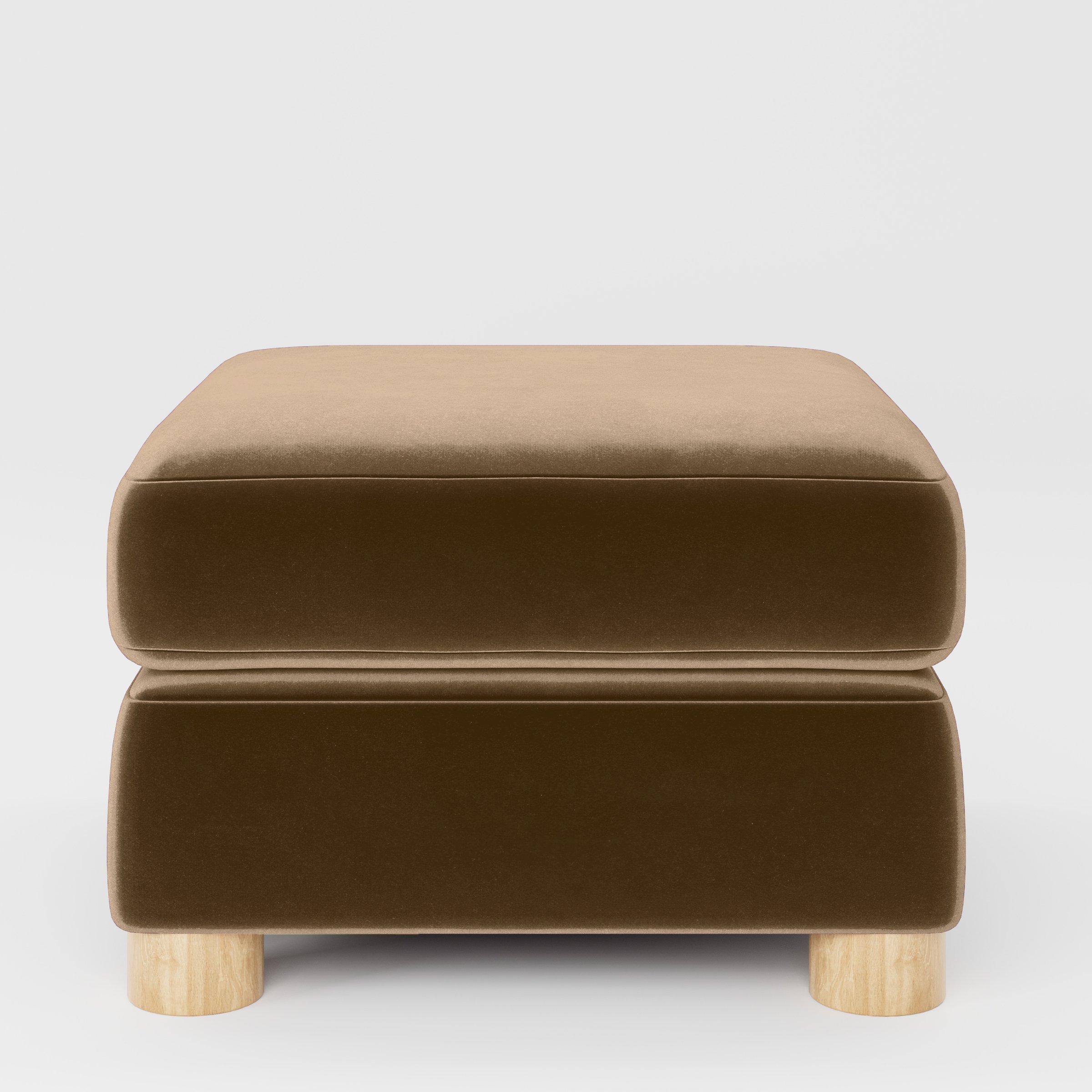 Front view of the Windermere footstool upholstered in Plush EasyClean Velvet in Caribou.
