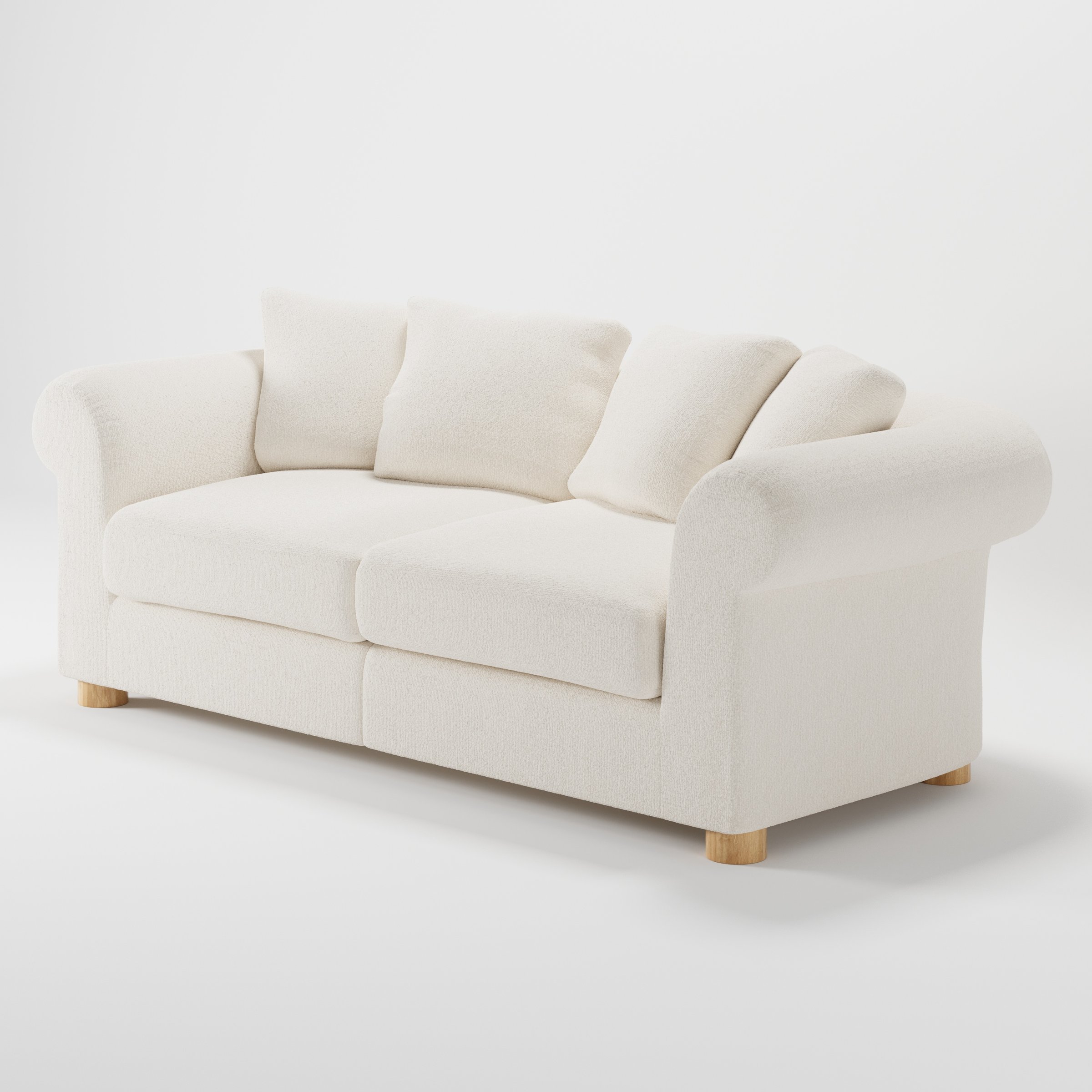 Windermere sofa in Kilda Boucle Cream shown at a diagonal angle highlighting arm profile and seat depth.
