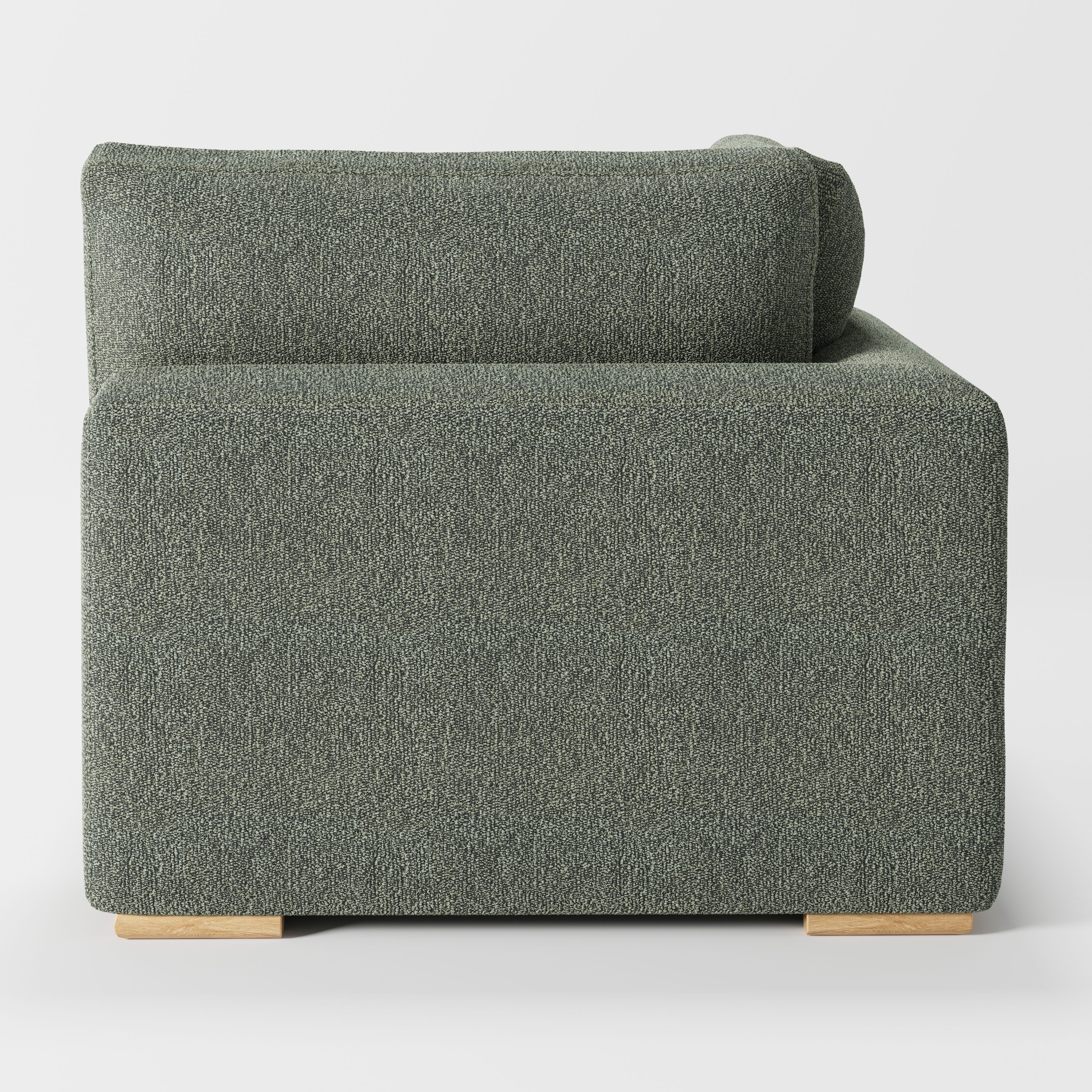 Olton corner unit in Kilda bouclé moss fabric, back view showing full upholstery and organic texture