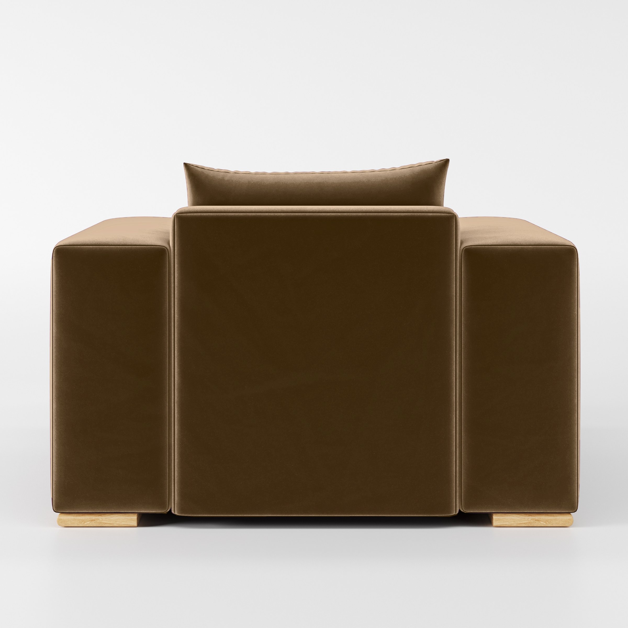 Rear view of the Fane armchair upholstered in Plush EasyClean Velvet in Caribou.