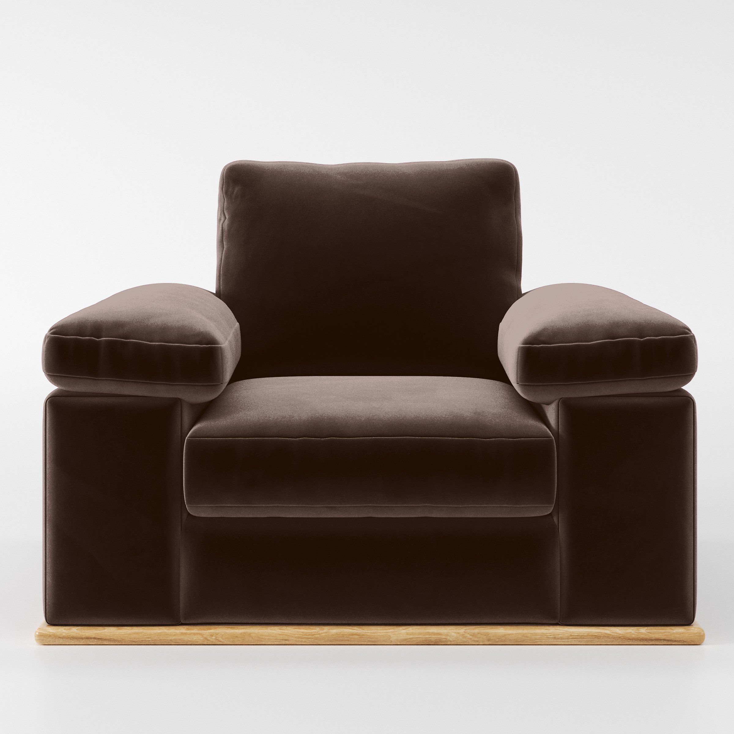 Front view of the Cusher armchair upholstered in Plush EasyClean Velvet in Mole.