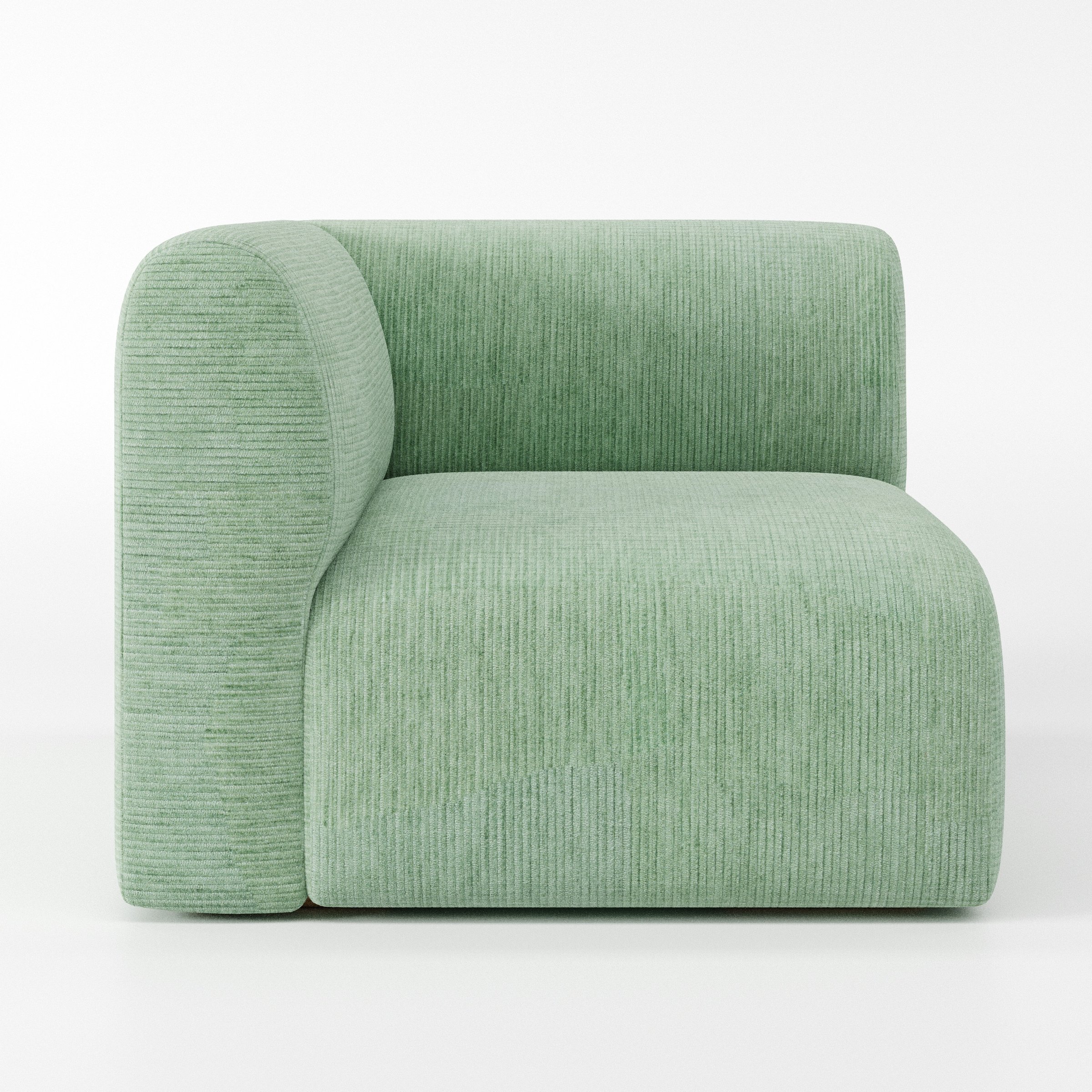 Drumquin modular sofa corner unit in Caldey Velvet Corduroy Eucalyptus shown from the left highlighting the wraparound back and soft, sculpted form.