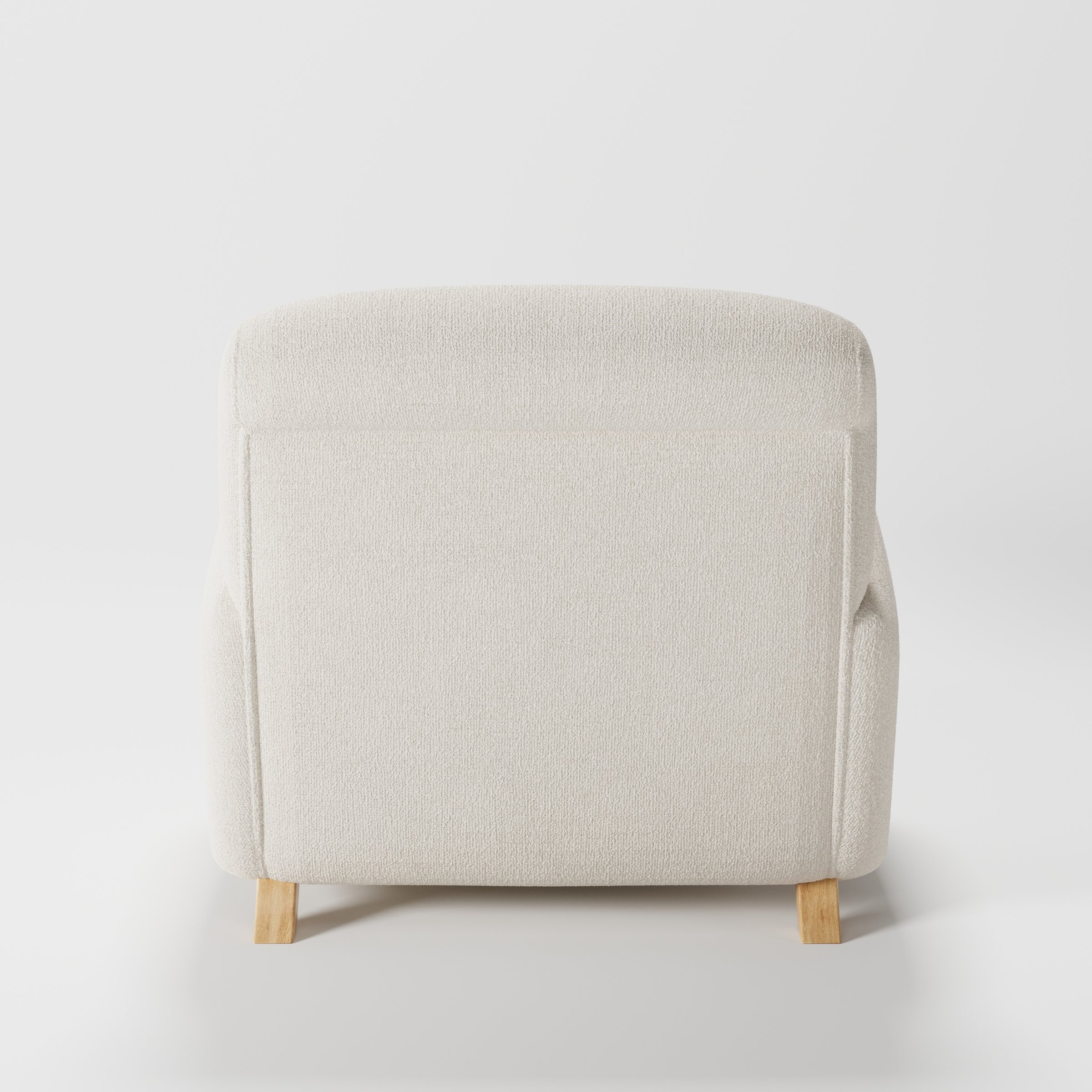 Rye armchair in Kilda Boucle Cream shown from the rear highlighting backrest shape and upholstery finish.