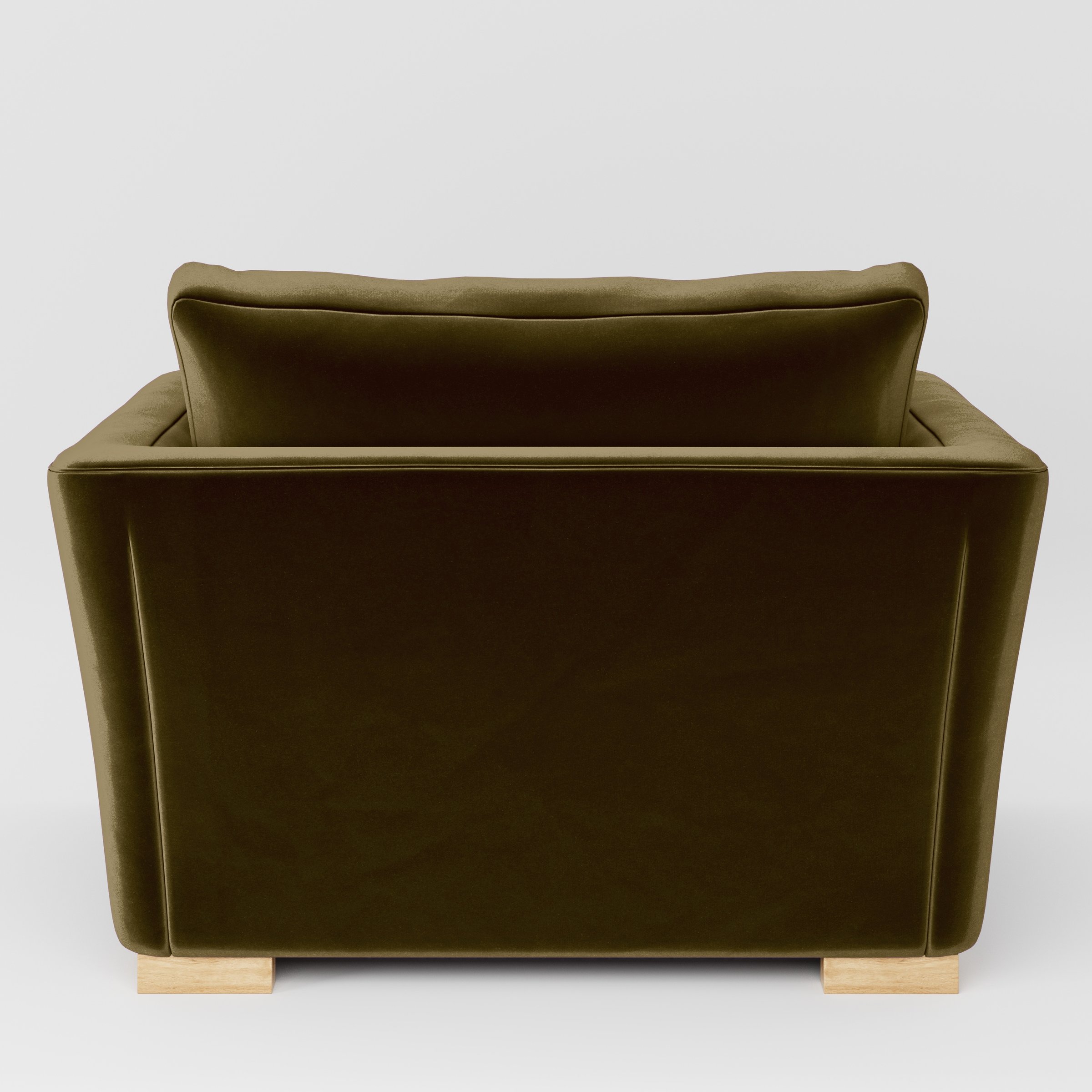Rear view of the Stowe armchair upholstered in Plush EasyClean Velvet in Cedar.