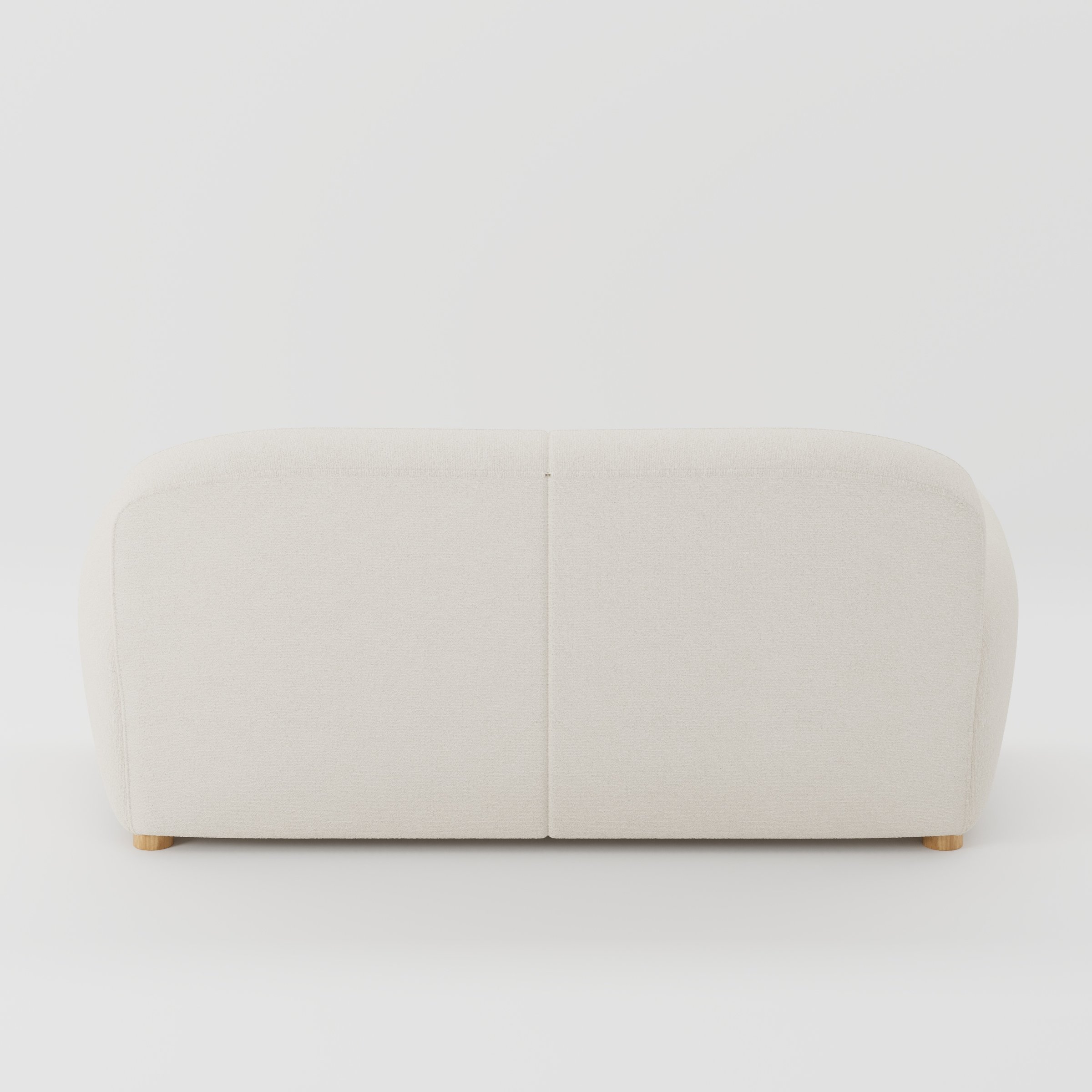Fergus sofa in Kilda Boucle Cream shown from the rear highlighting back cushions and upholstery finish.