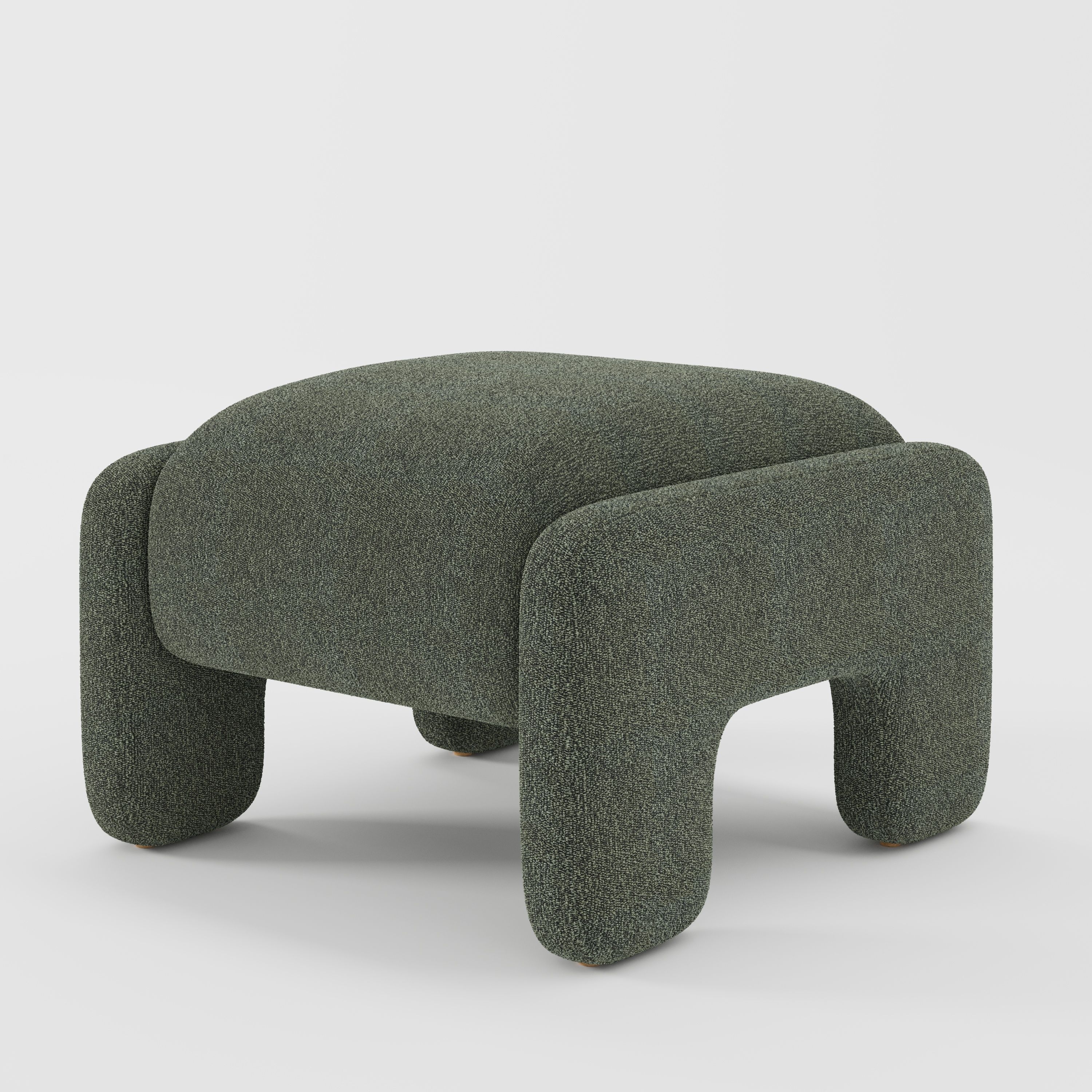 Inny footstool in Kilda bouclé moss fabric, diagonal view highlighting organic shape and tactile finish