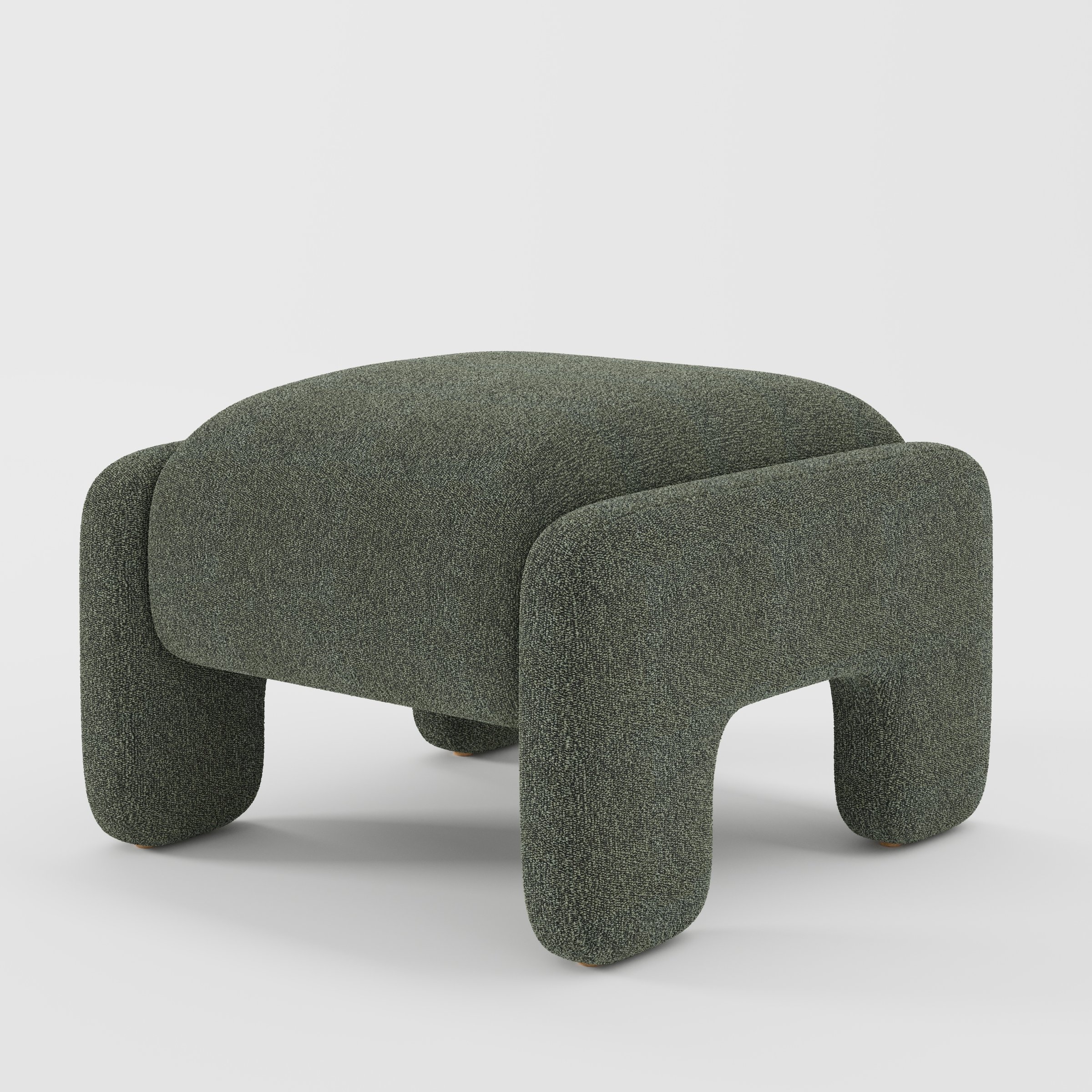 Inny footstool in Kilda bouclé moss fabric, diagonal view highlighting organic shape and tactile finish