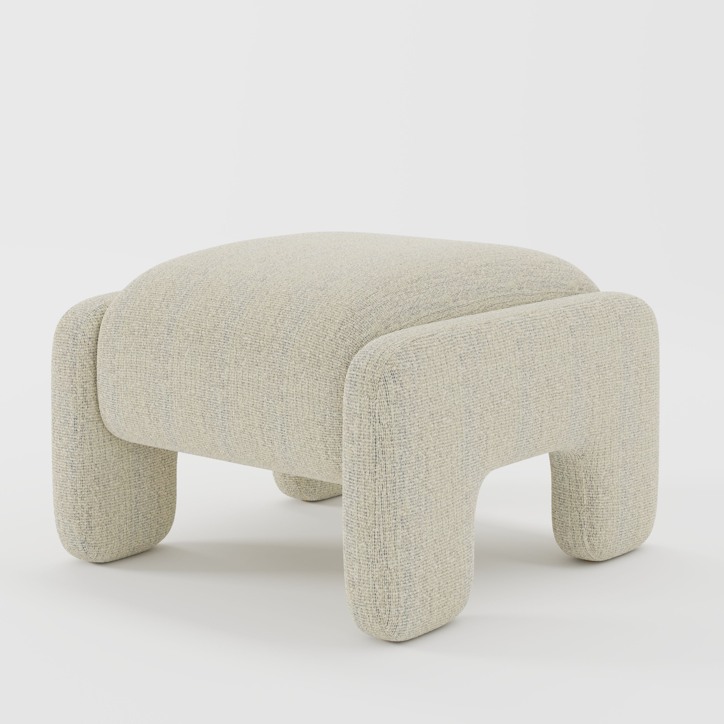 Inny footstool in Orsay bouclé cream and marine fabric, diagonal view highlighting rounded edges and tonal contrast