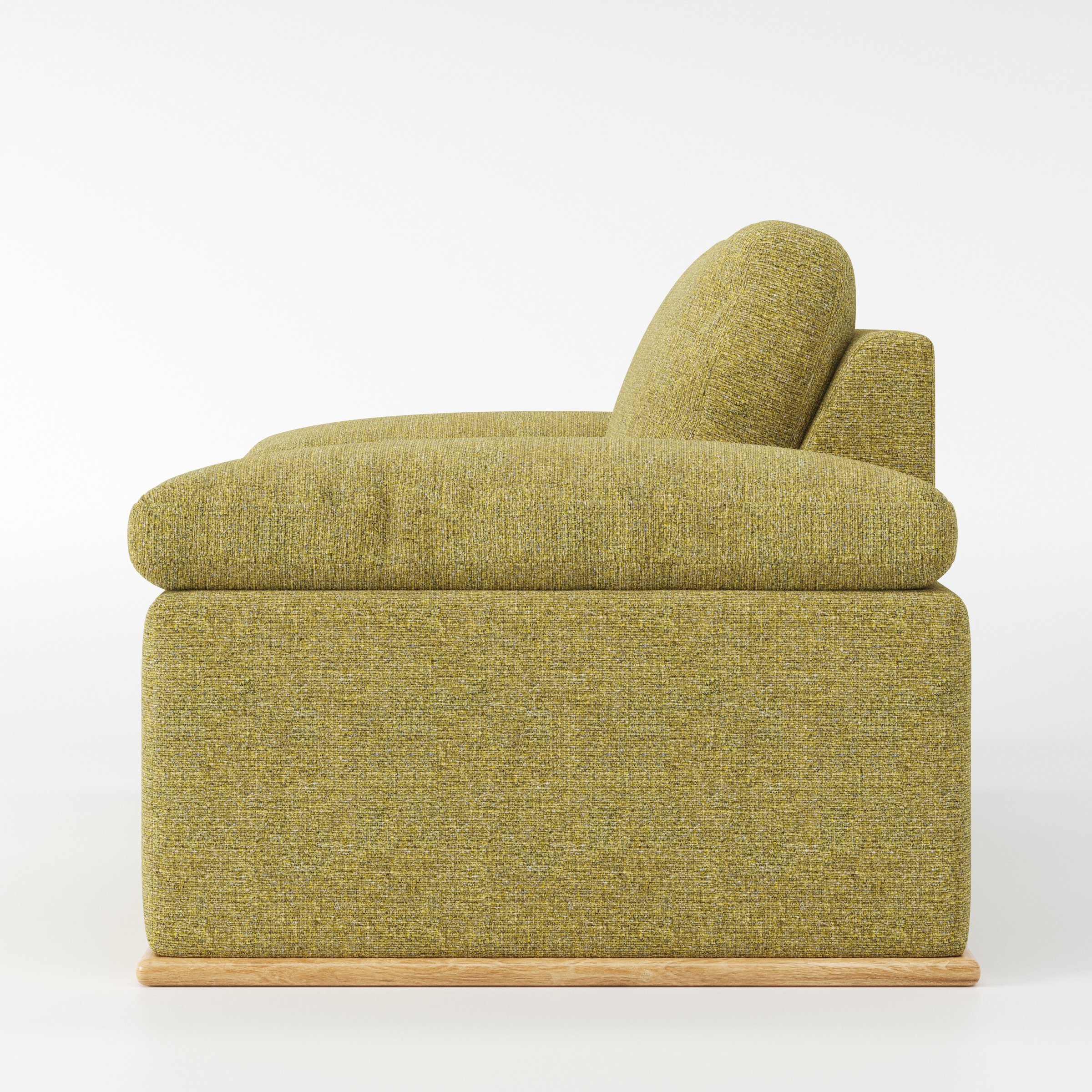 Cusher armchair in Heyling Tweed Sencha shown in side profile displaying proportions and overall silhouette.