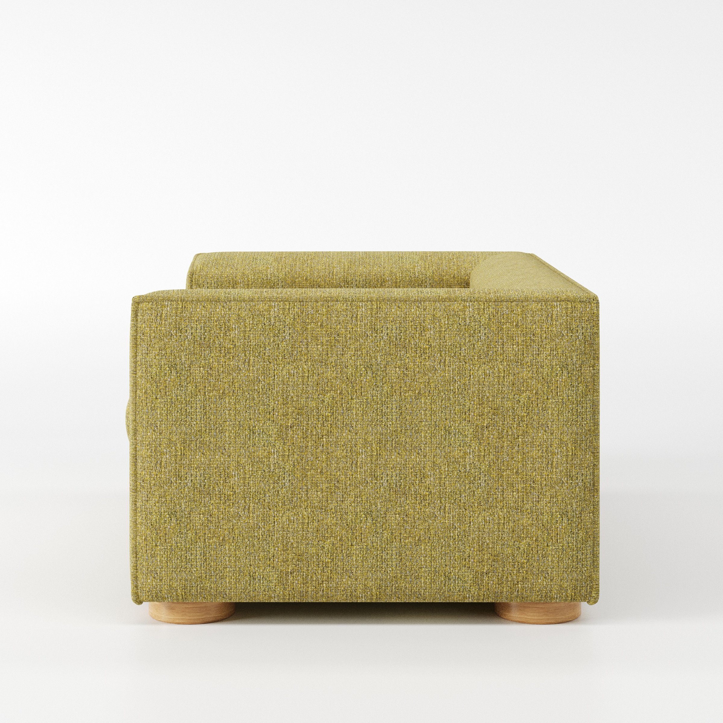 Feale armchair in Heyling Tweed Sencha shown in side profile displaying proportions and overall silhouette.