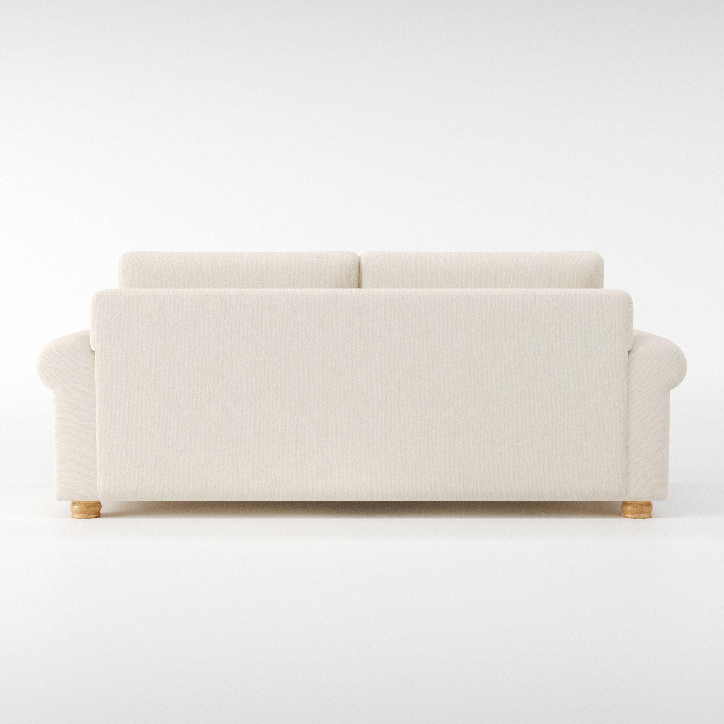 Anna Lee sofa in Kilda Boucle Cream shown from the rear highlighting back cushions and upholstery finish.