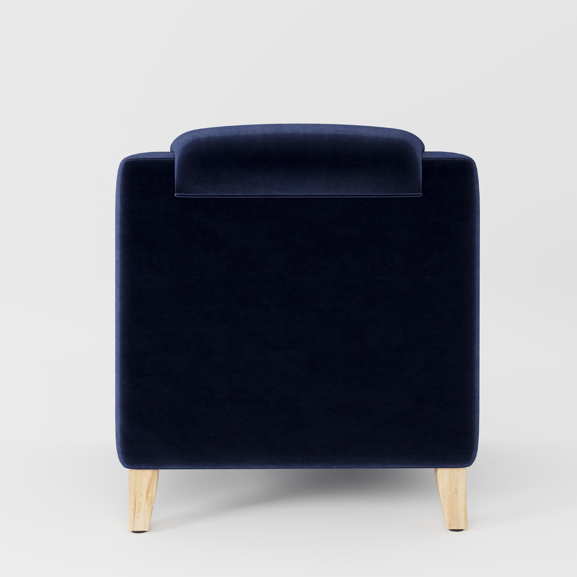 Erne armchair in Noss Velvet Navy shown from the rear highlighting backrest shape and upholstery finish.