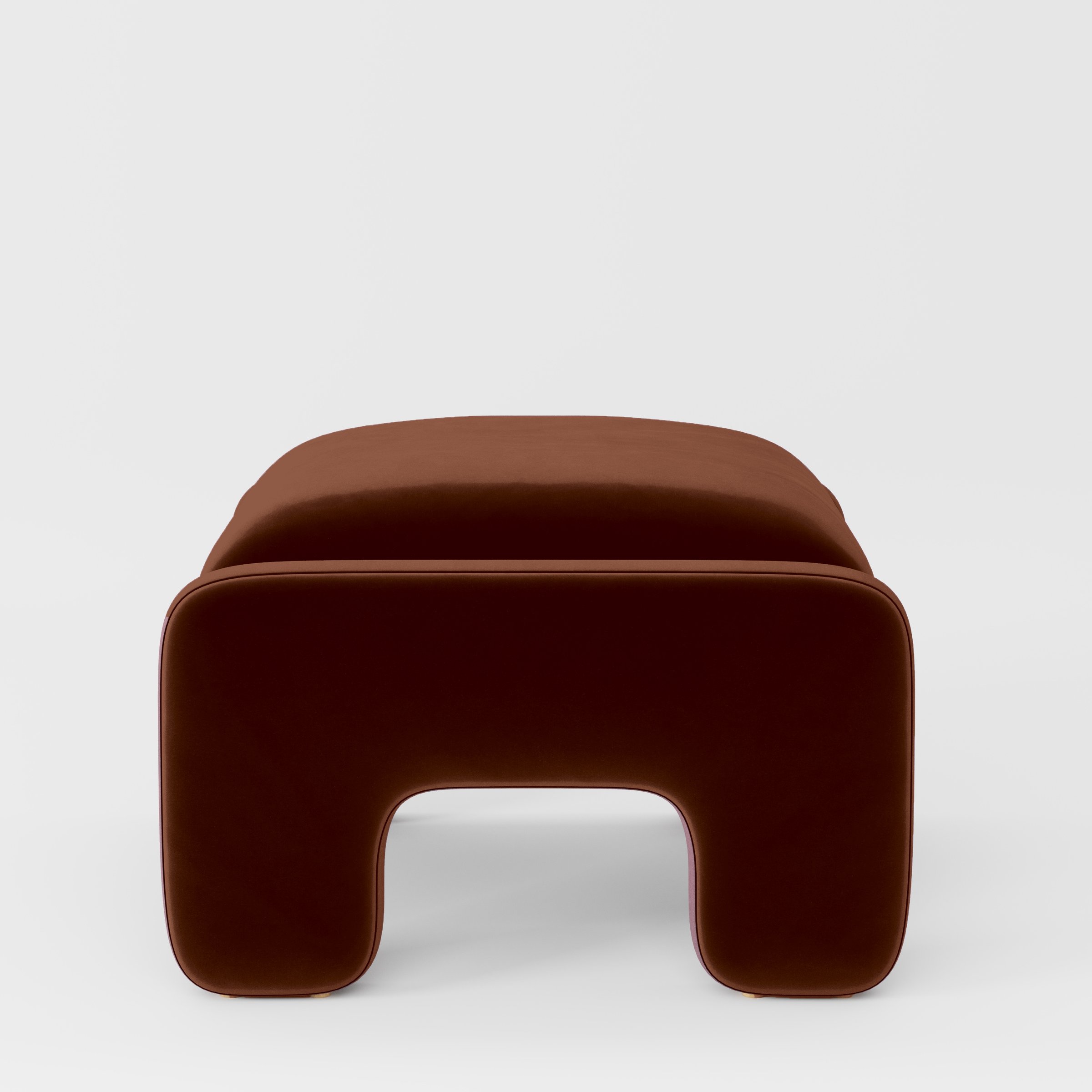 Side view of the Inny footstool upholstered in Plush EasyClean Velvet in Maple.
