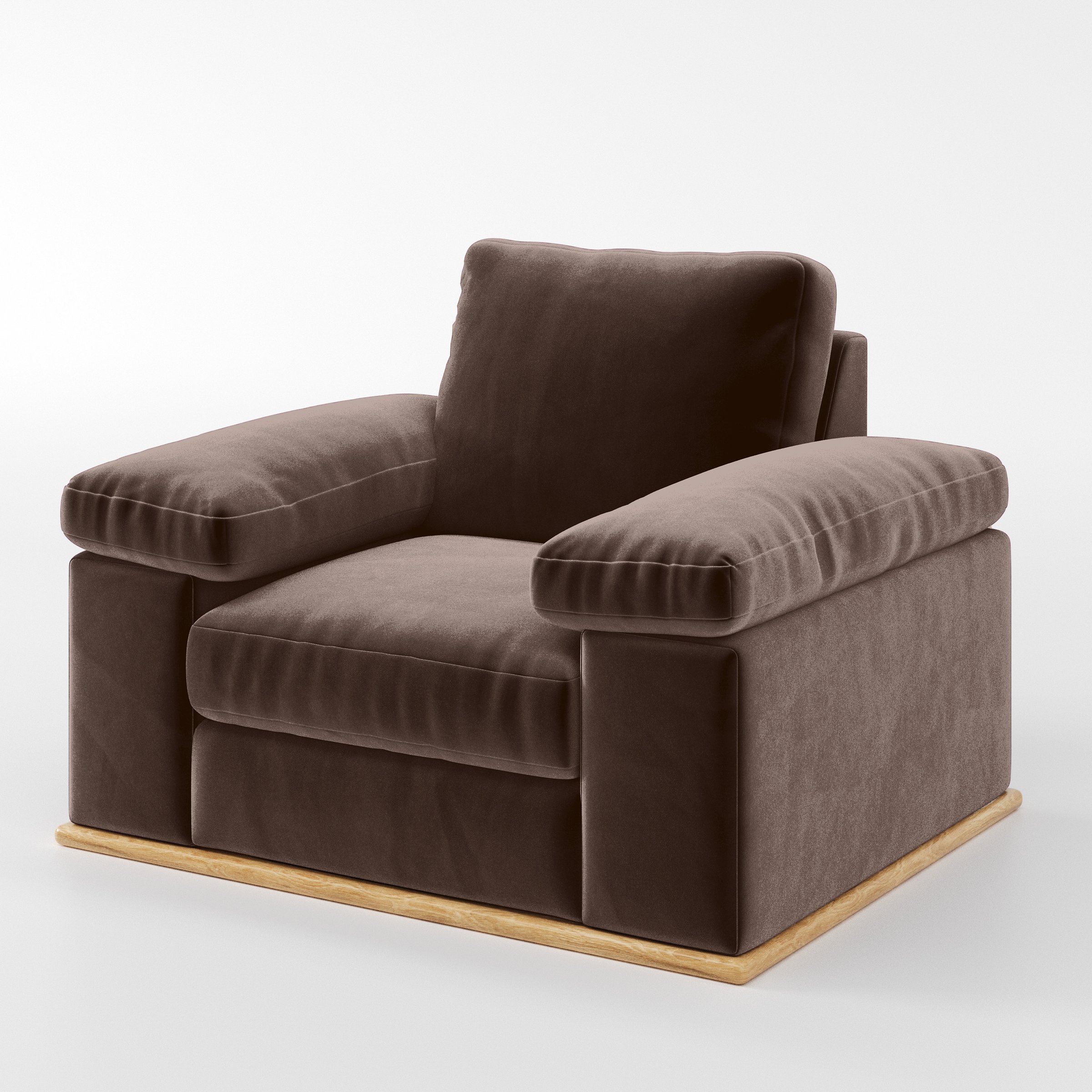 Diagonal view of the Cusher armchair upholstered in Plush EasyClean Velvet in Mole.