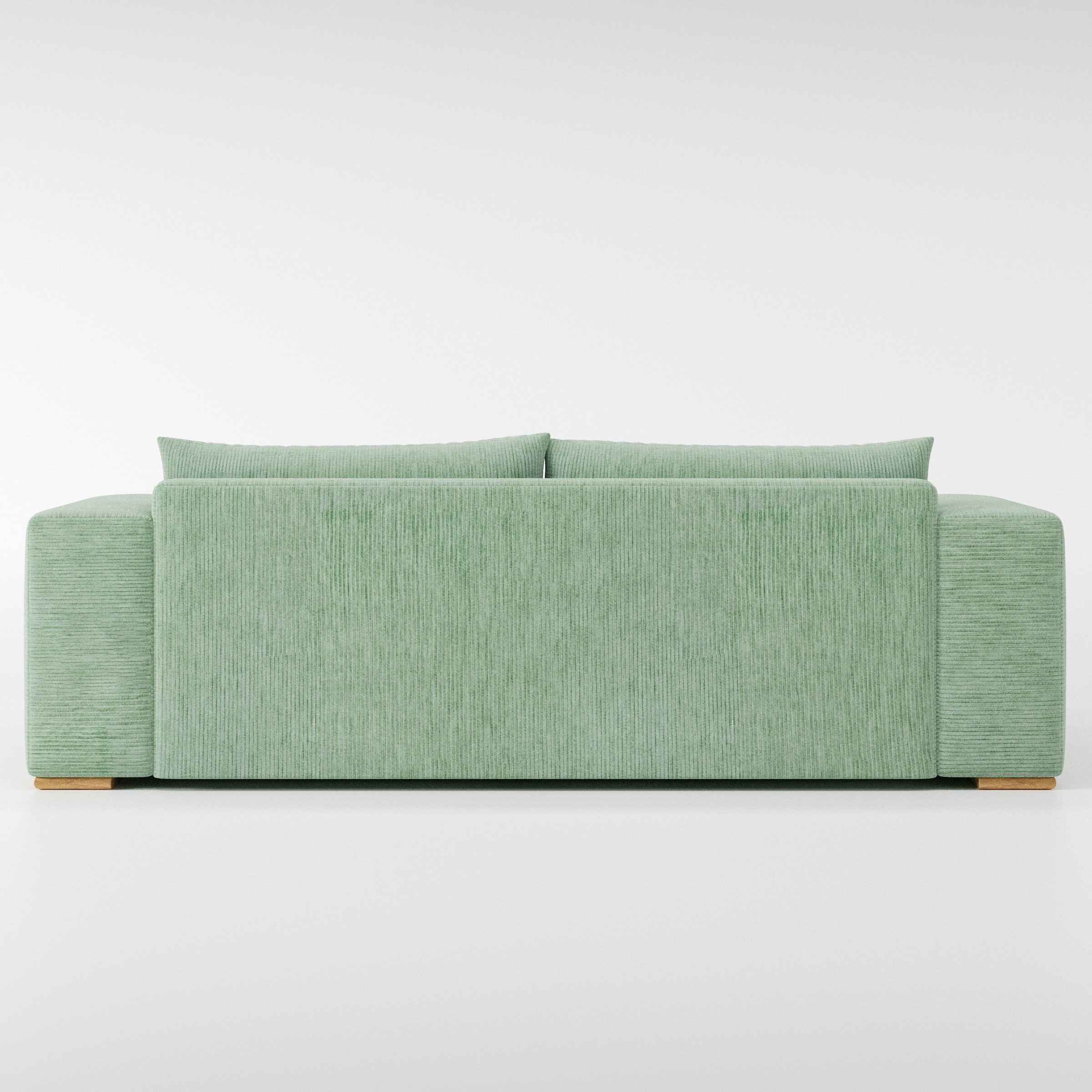 Fane sofa in Caldey Velvet Corduroy Eucalyptus shown from the rear highlighting back cushions and upholstery finish.