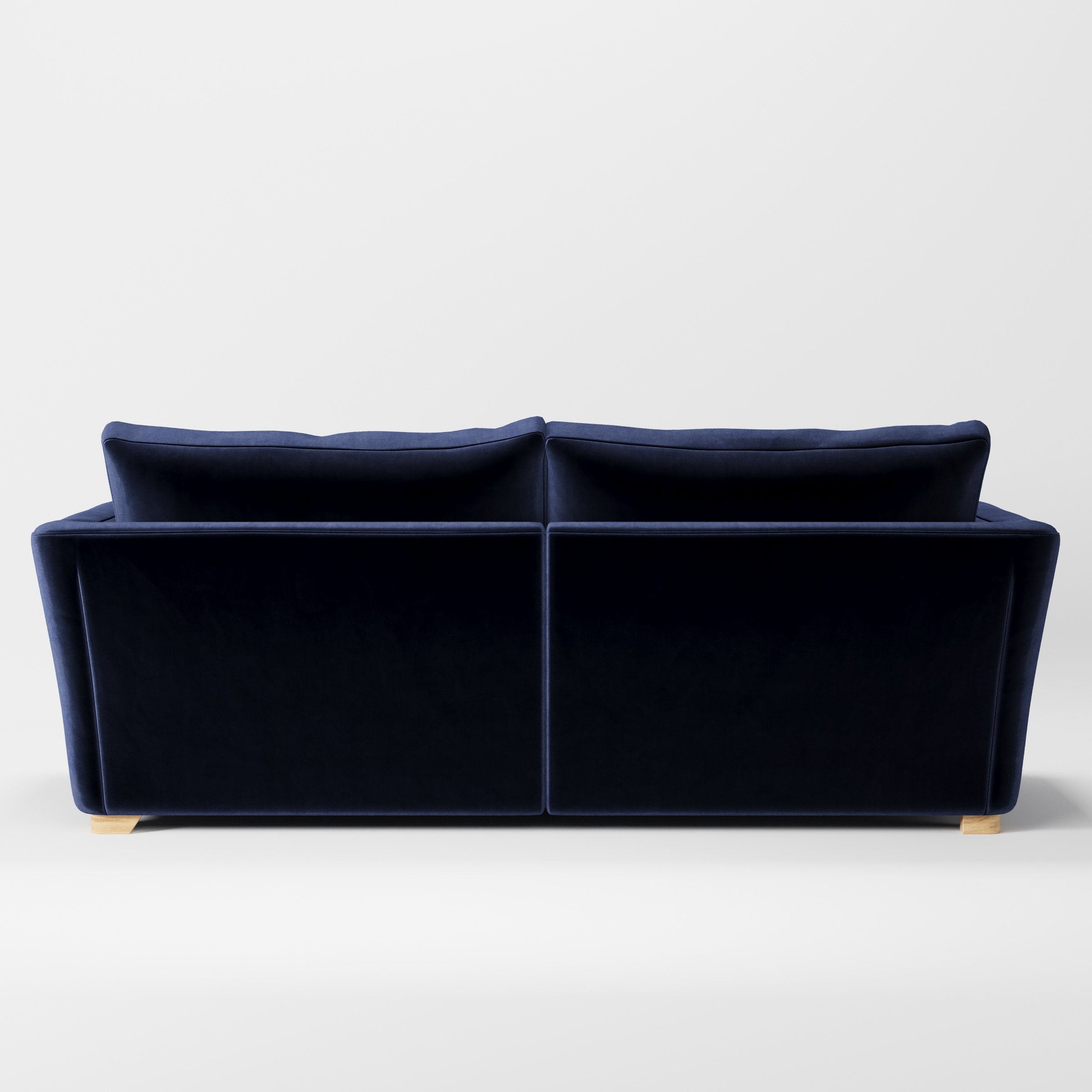 Stowe sofa in Noss Velvet Navy shown from the rear highlighting back cushions and upholstery finish.