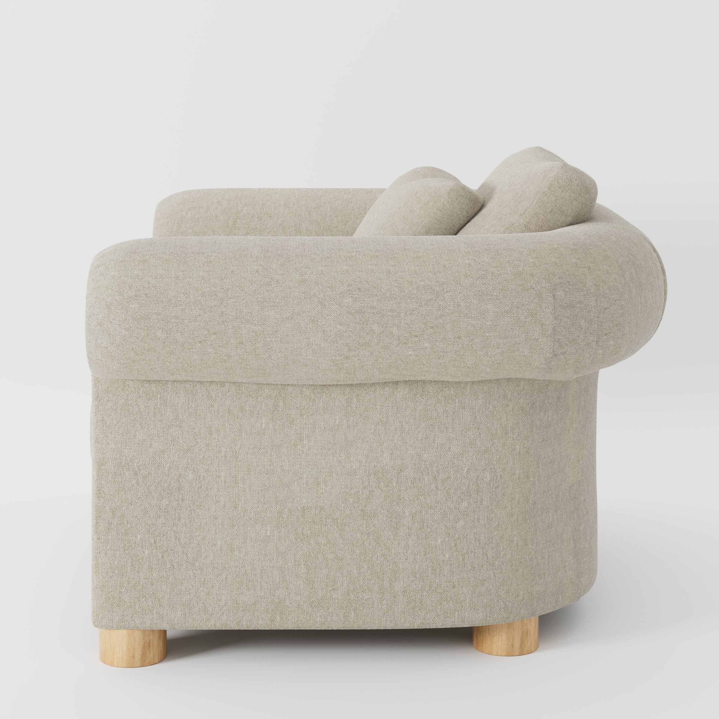 Windermere armchair in Alderney Linen Oatmeal shown in side profile displaying proportions and overall silhouette.