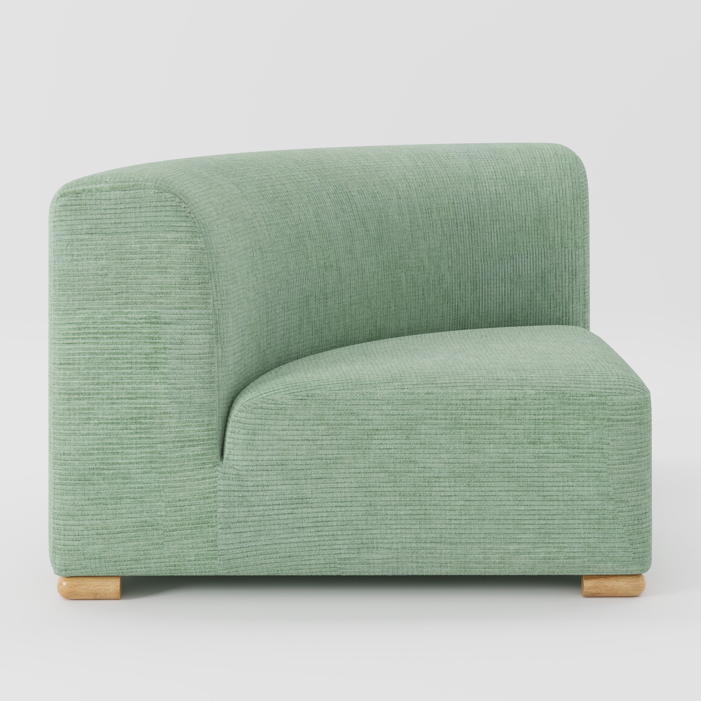 Tay corner sofa unit in Caldey Velvet Corduroy Eucalyptus shown from the side highlighting the curved backrest and deep seat with timber feet.