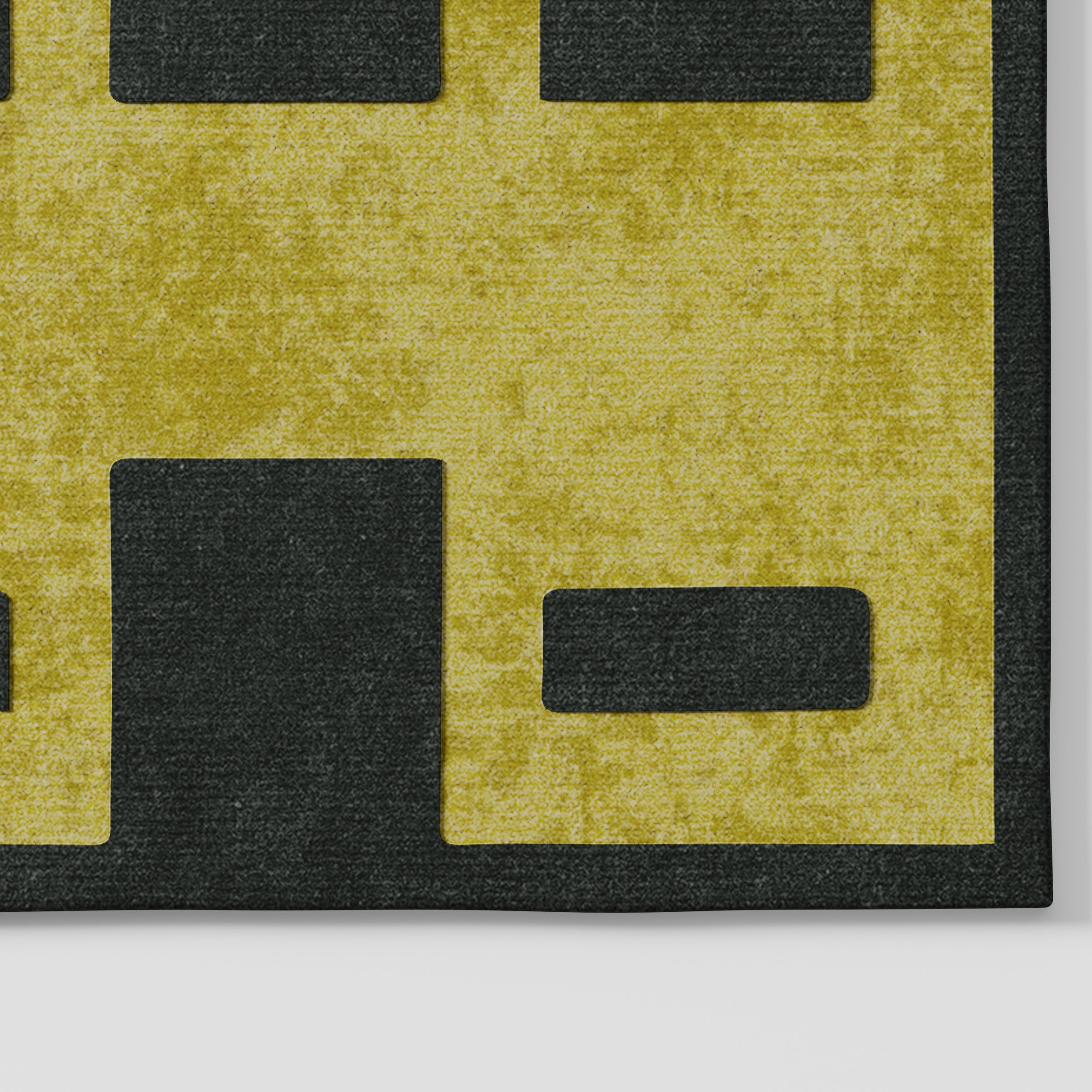Wye rug in green and black with bold geometric pattern, close-up detail showing textured surface and contrasting shapes, hand tufted wool and viscose blend