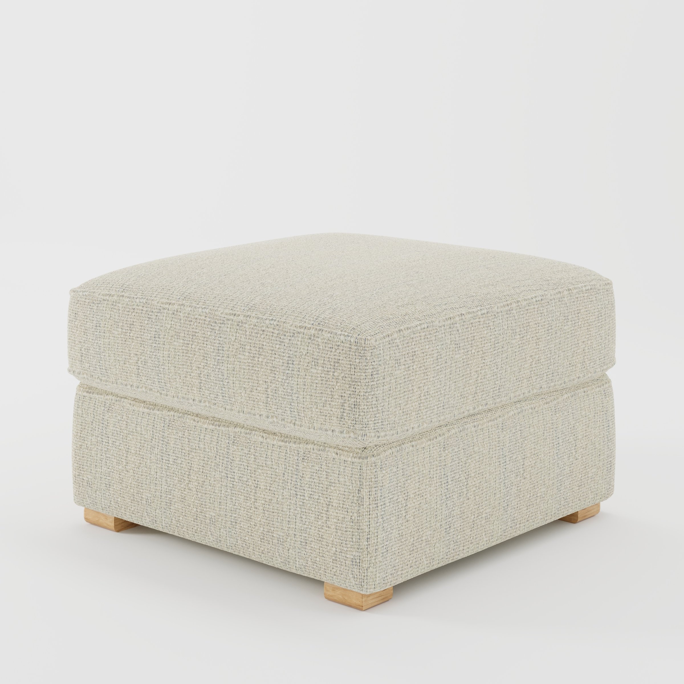 Cashel footstool in Orsay Boucle Cream and Marine shown at a diagonal angle highlighting layered cushioning and low wooden feet.
