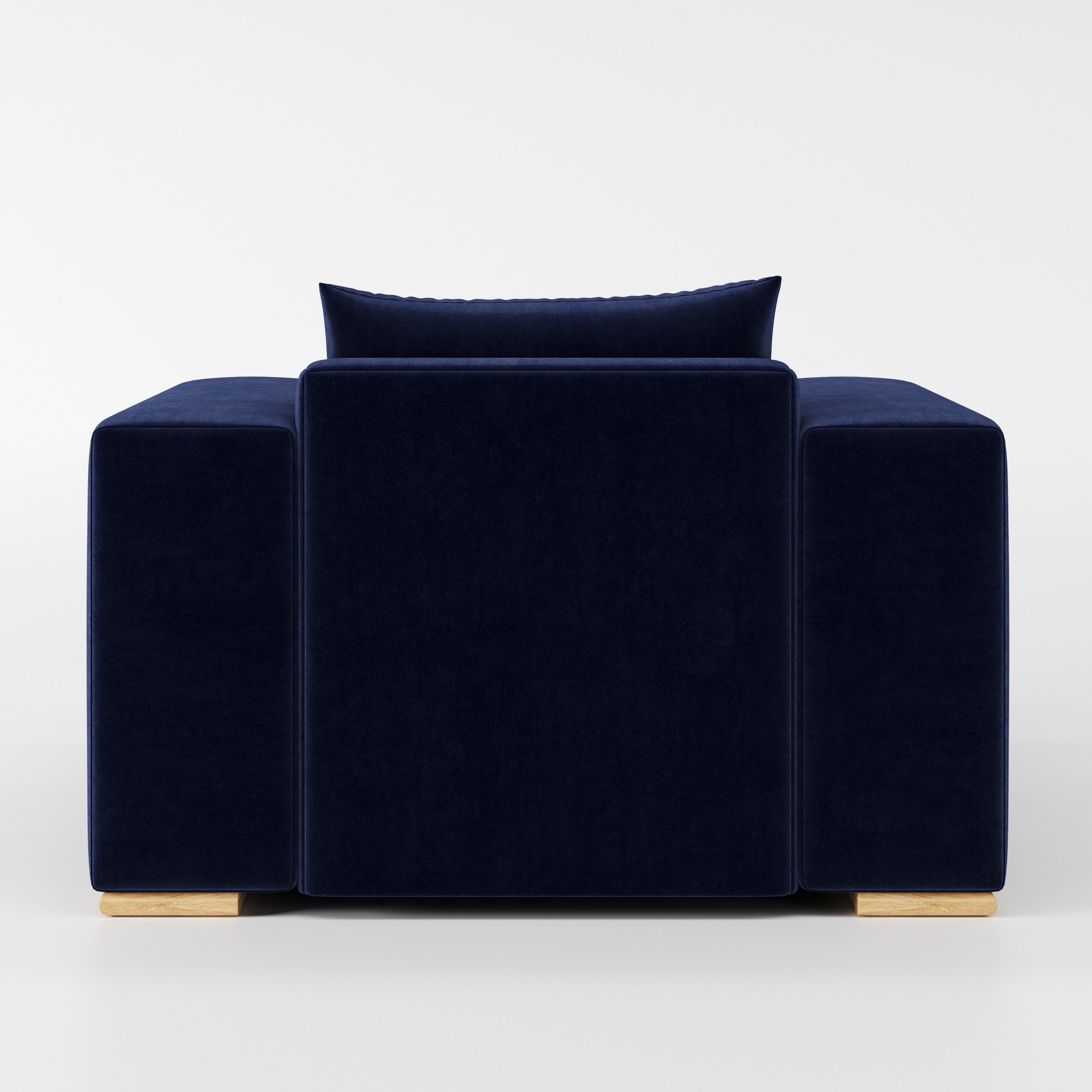 Fane armchair in Noss Velvet Navy shown from the rear highlighting backrest shape and upholstery finish.